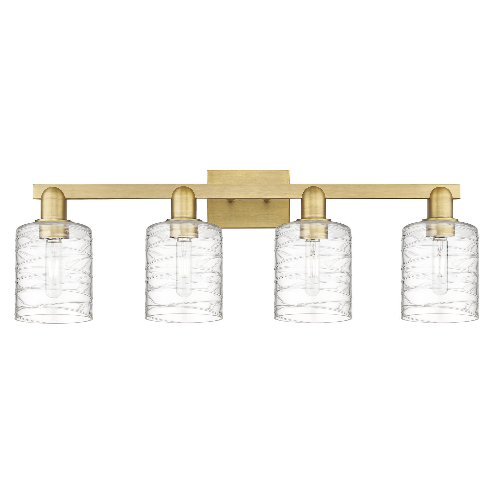 Shown in Brushed Brass finish and Deco Swirl glass