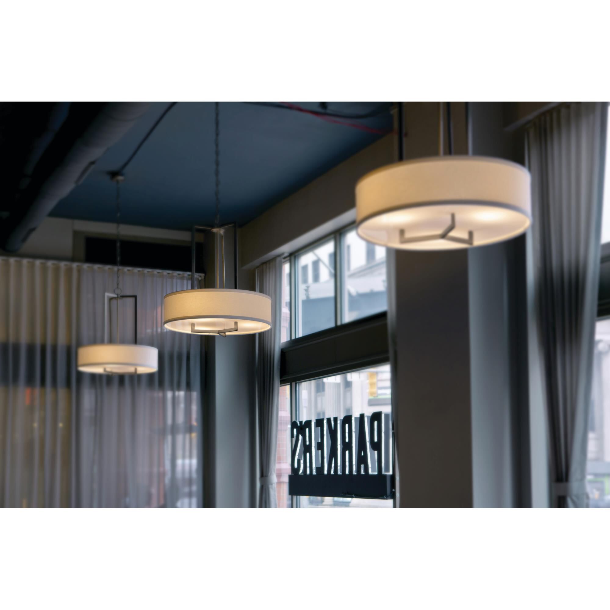 Shown in Antique Nickel finish and Off-White Linen Hardback shade