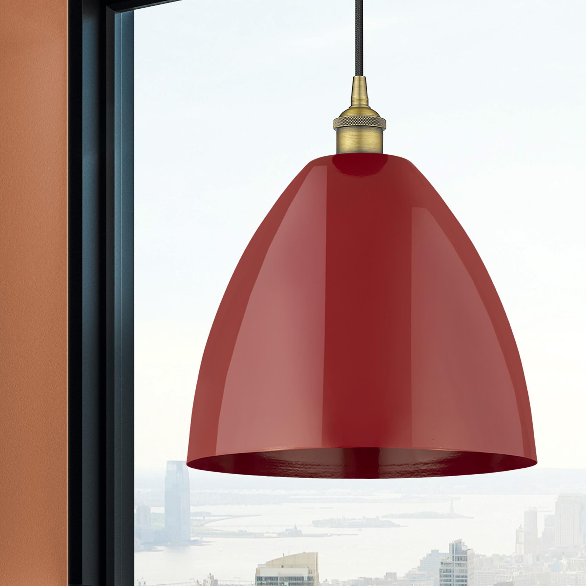 Shown in Brushed Brass finish and Red Plymouth Dome shade