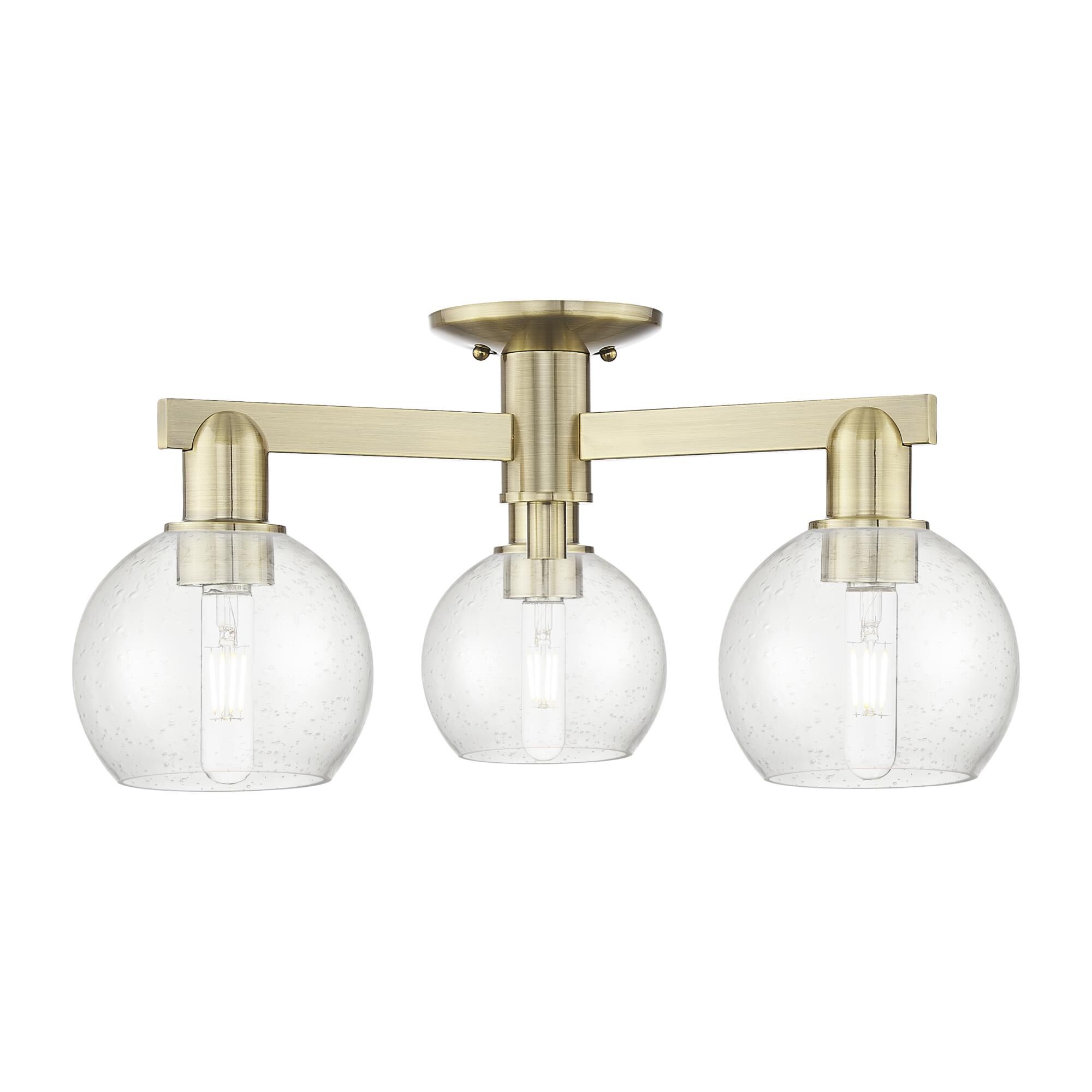 Shown in Antique Brass finish and Seedy glass