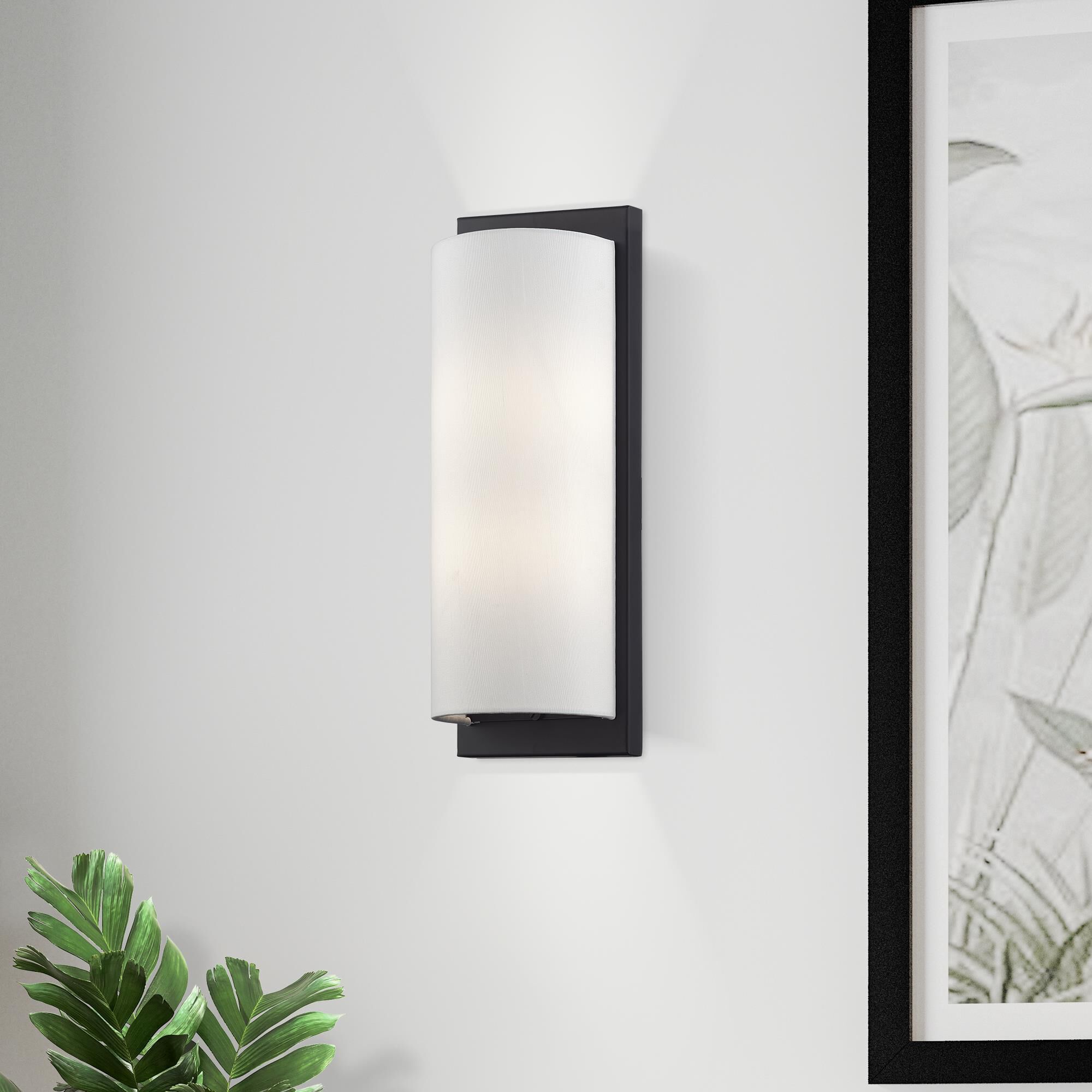 Shown in Black finish and Hand Crafted Off-White Fabric Hardback shade