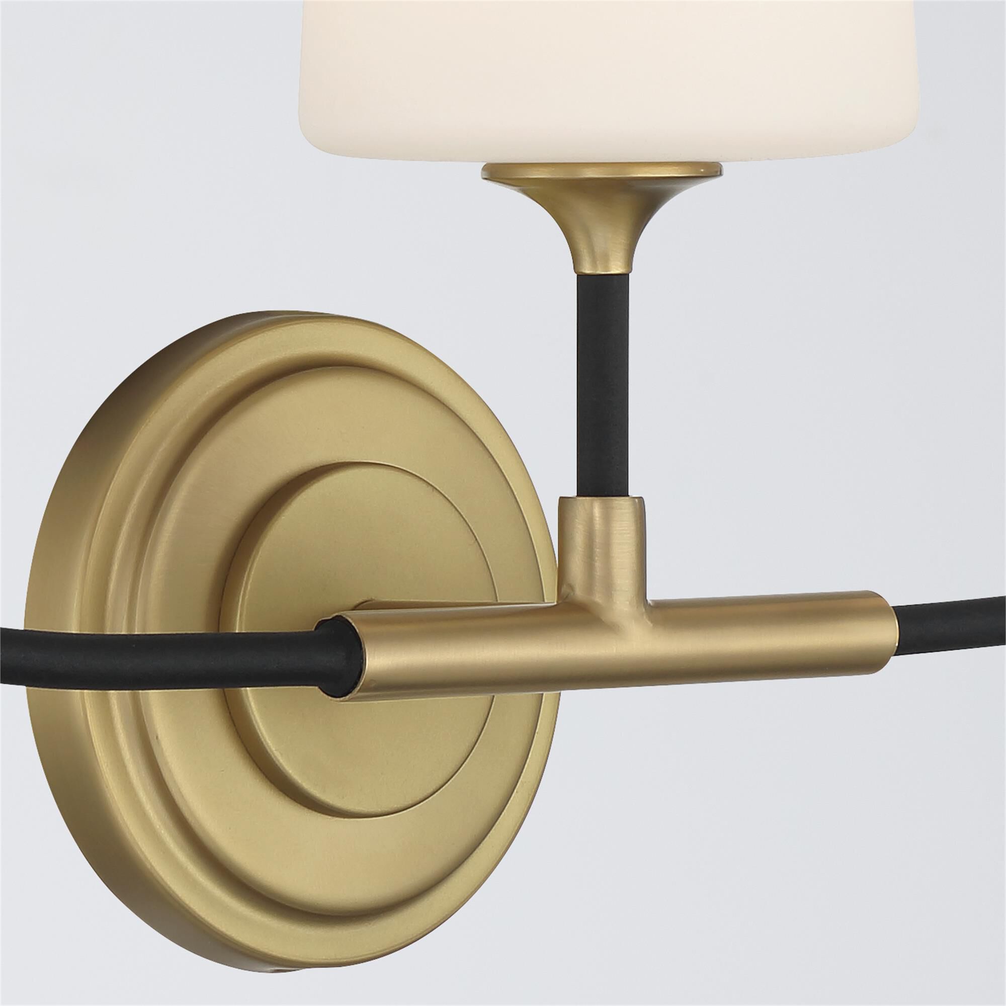 Shown in Black Forged and Modern Gold finish and White glass