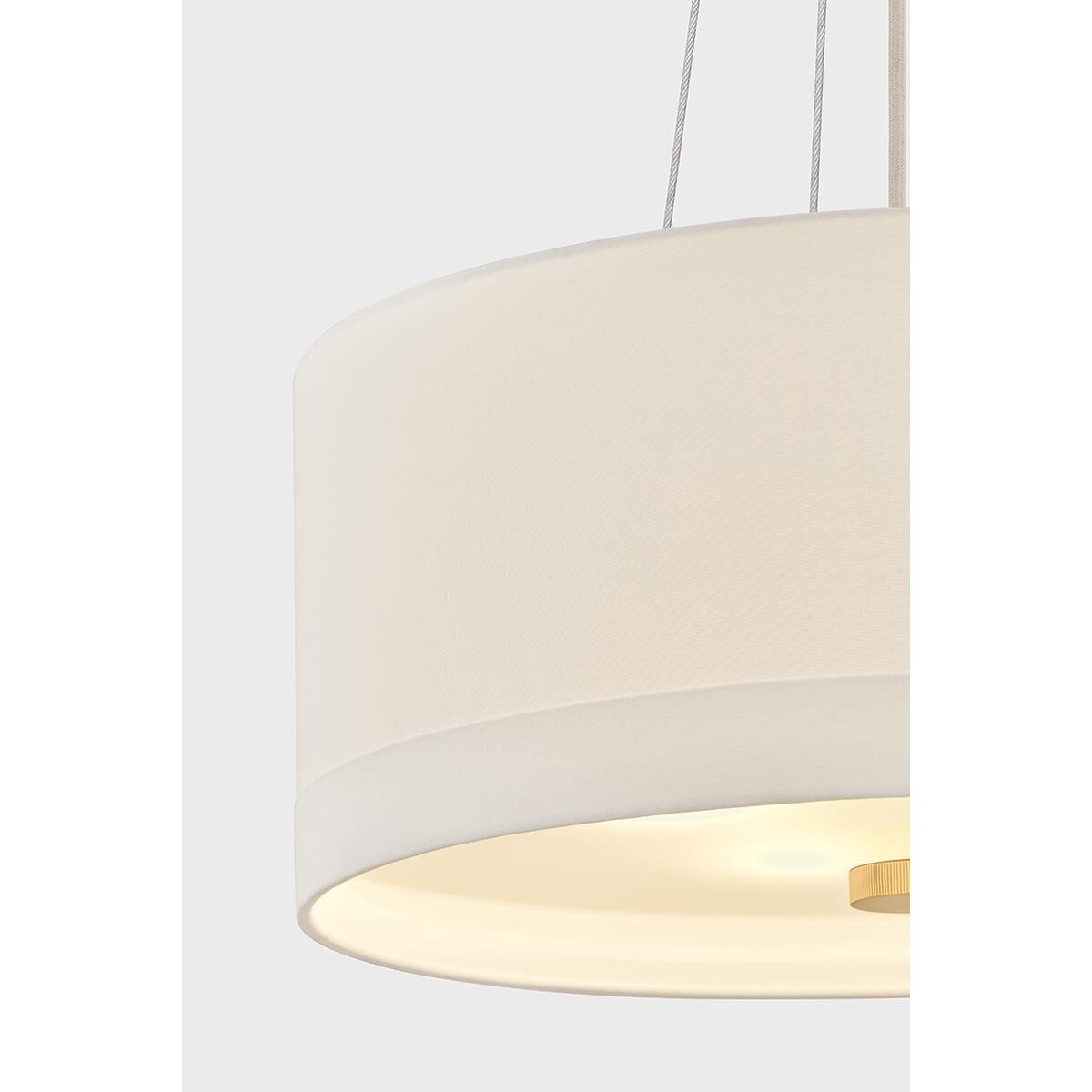 Shown in Aged Brass finish and White Linen shade