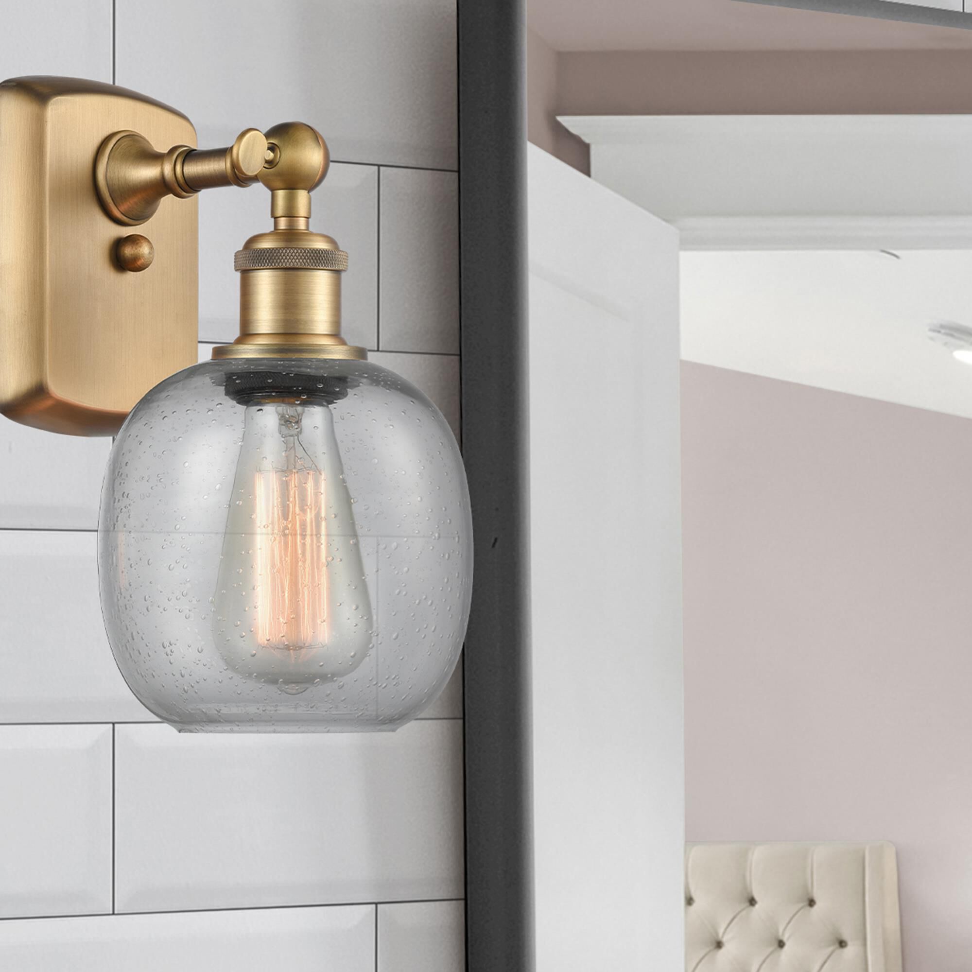 Shown in Brushed Brass finish and Sphere glass and Glass shade
