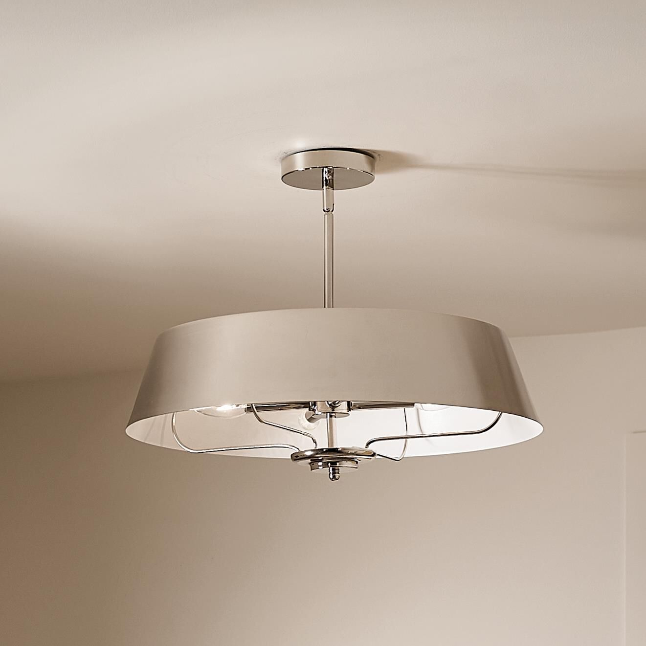 Shown in Polished Nickel finish and Metal shade