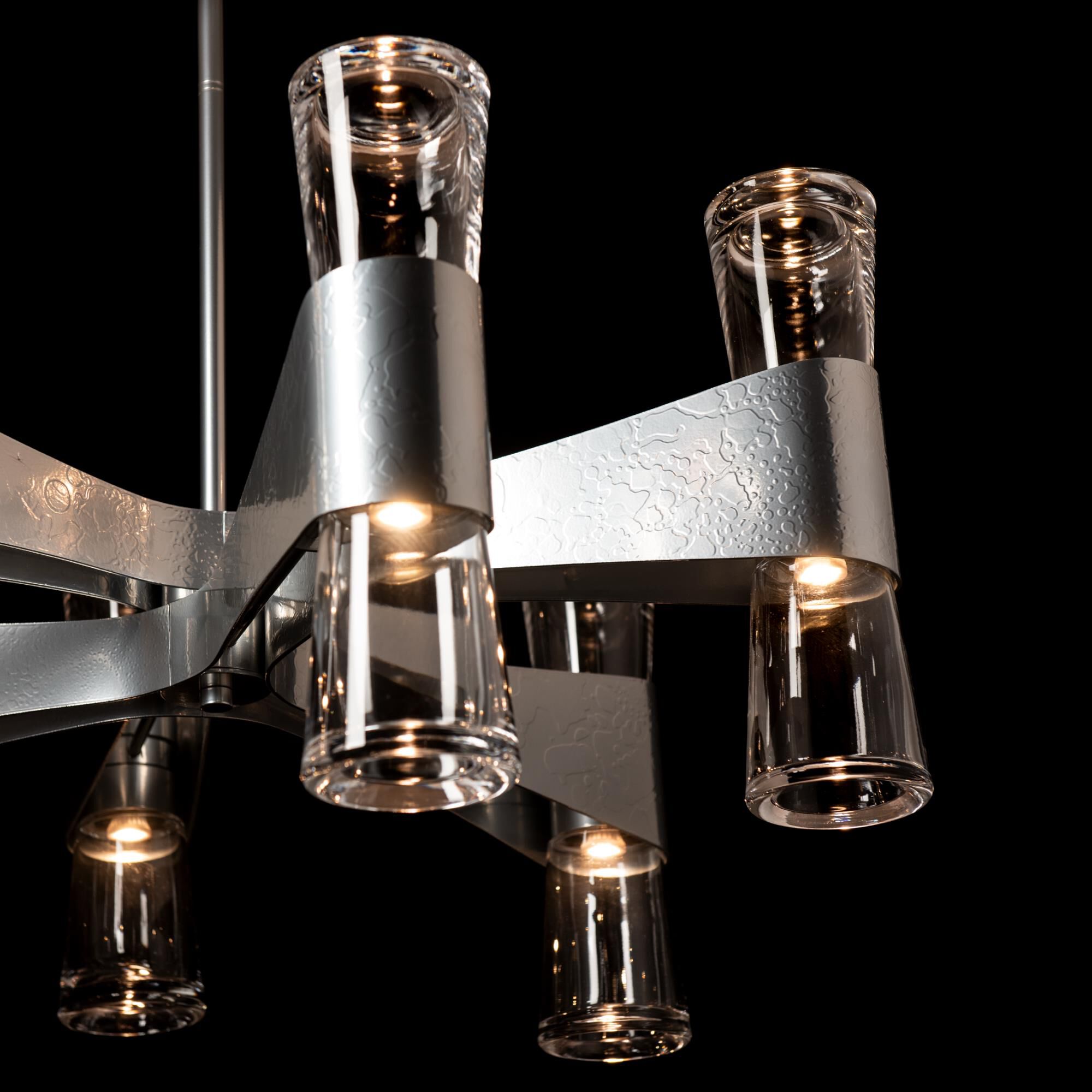 Shown in Sterling finish and Clear glass