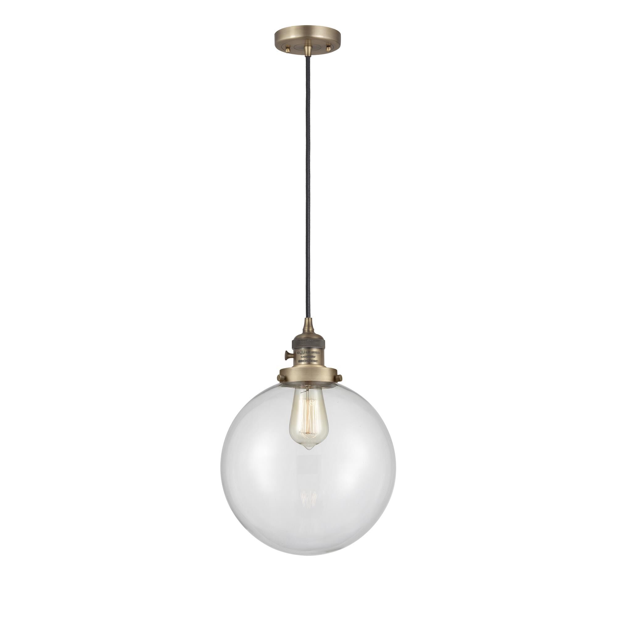 Shown in Brushed Brass finish and Clear glass
