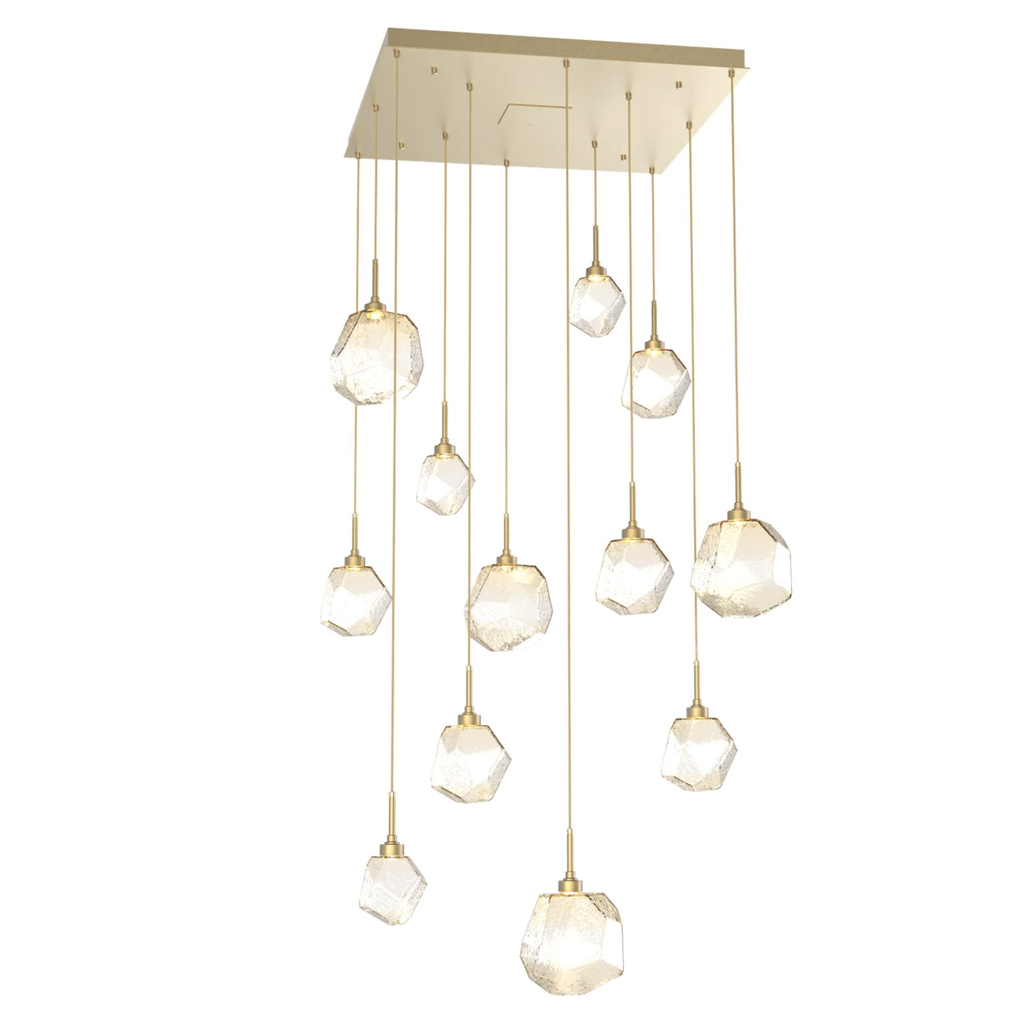 Shown in Gilded Brass finish and Amber glass