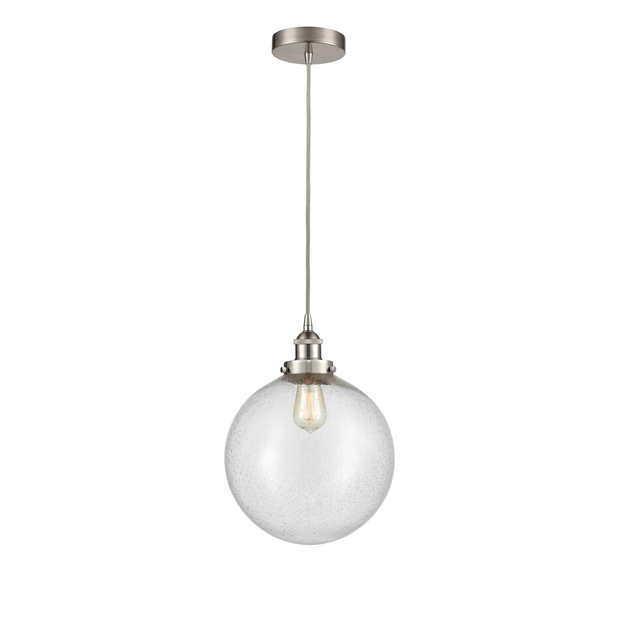 Shown in Brushed Satin Nickel finish and Seedy Beacon glass