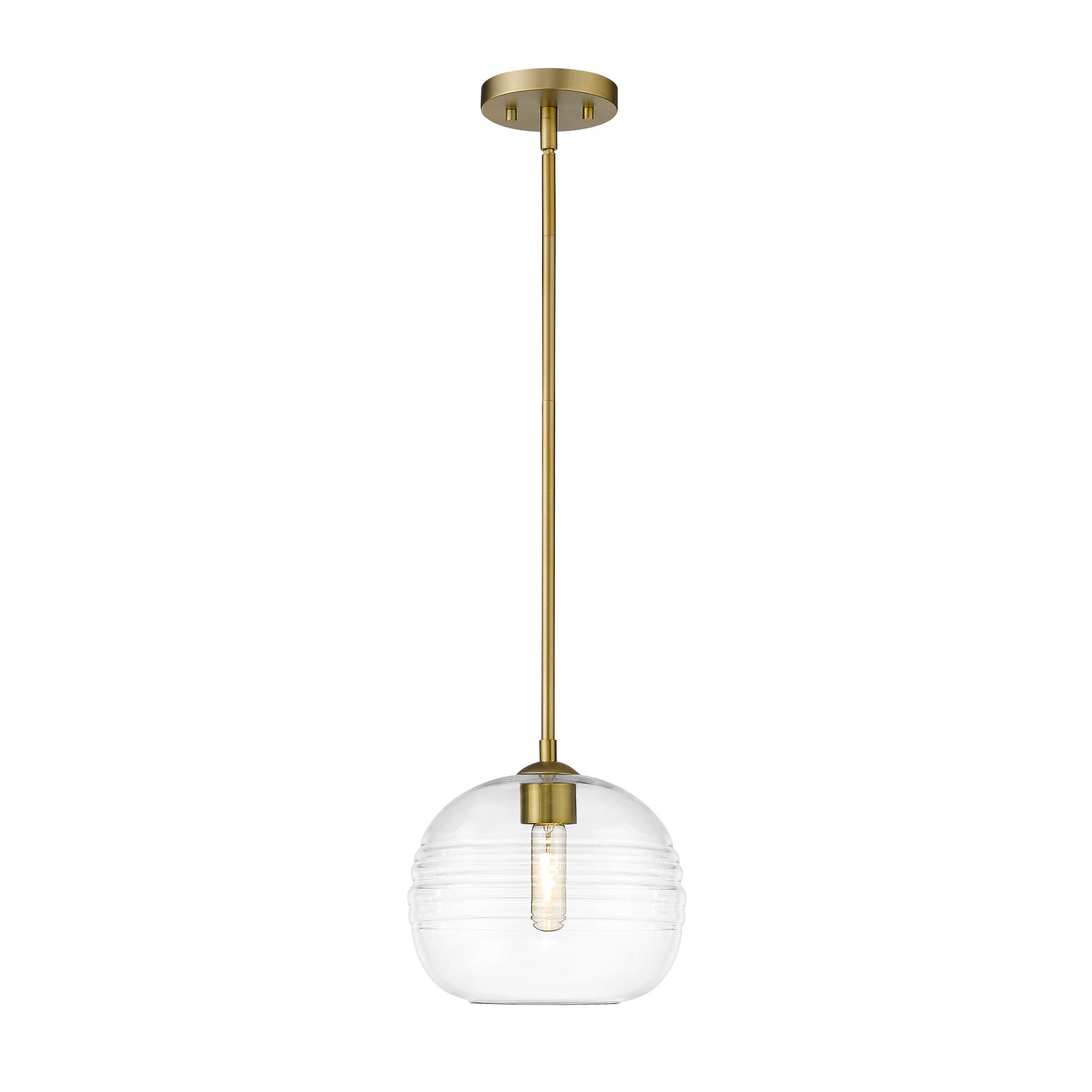Shown in Olde Brass finish and Glass shade