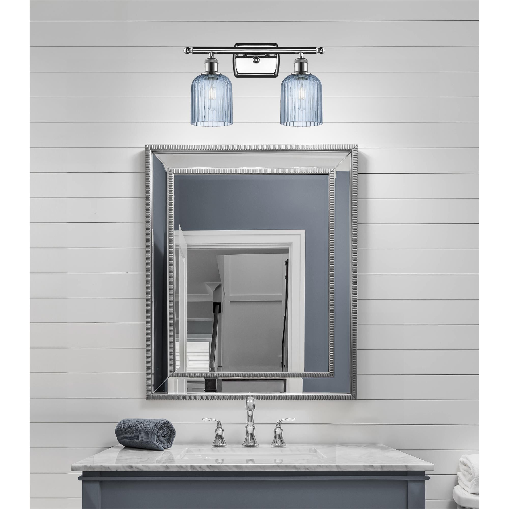 Shown in Polished Chrome finish and Princess Blue glass