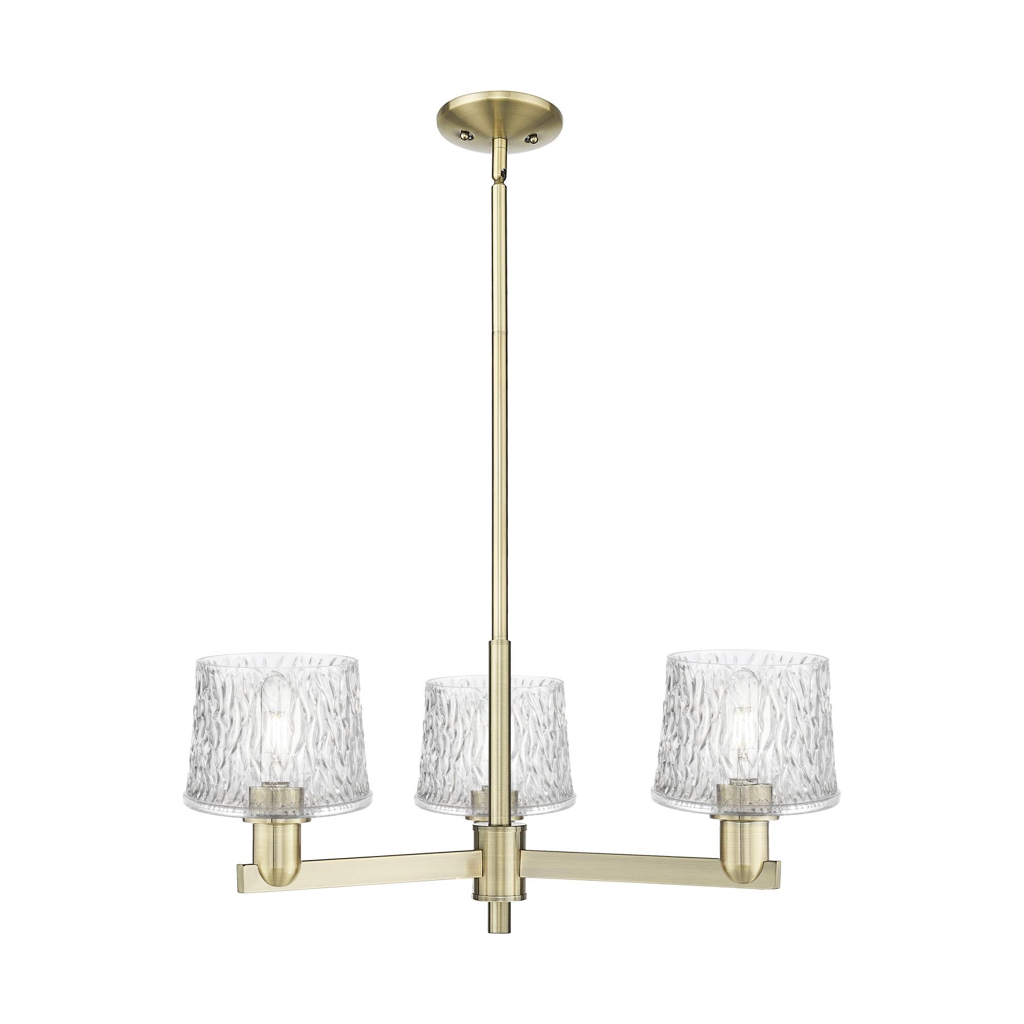 Shown in Antique Brass finish and Clear glass