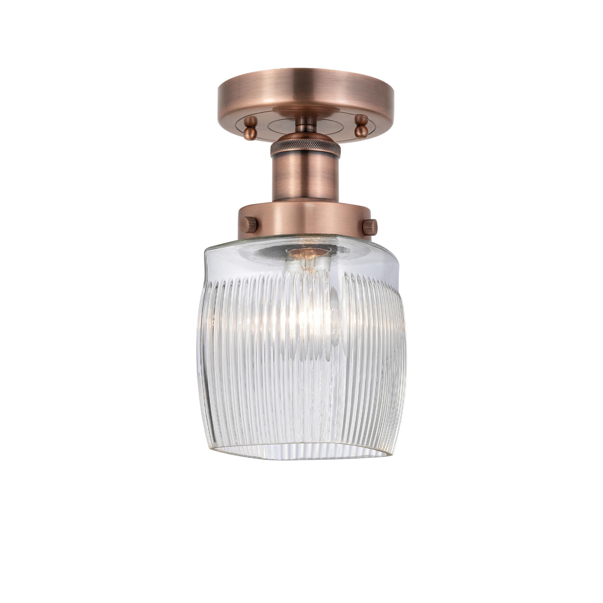 Shown in Antique Copper finish and Clear Halophane glass