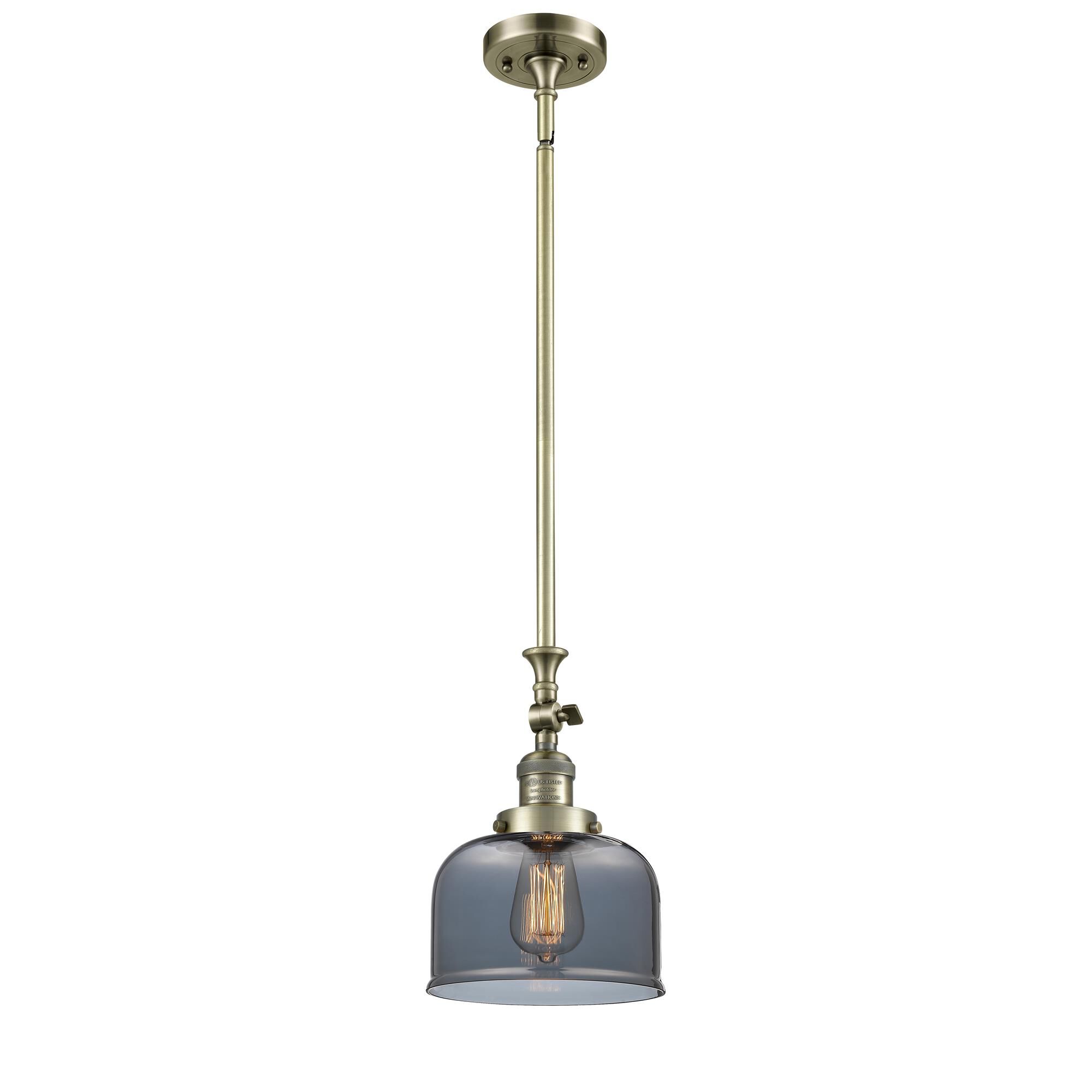 Shown in Antique Brass finish and Plated Smoked glass