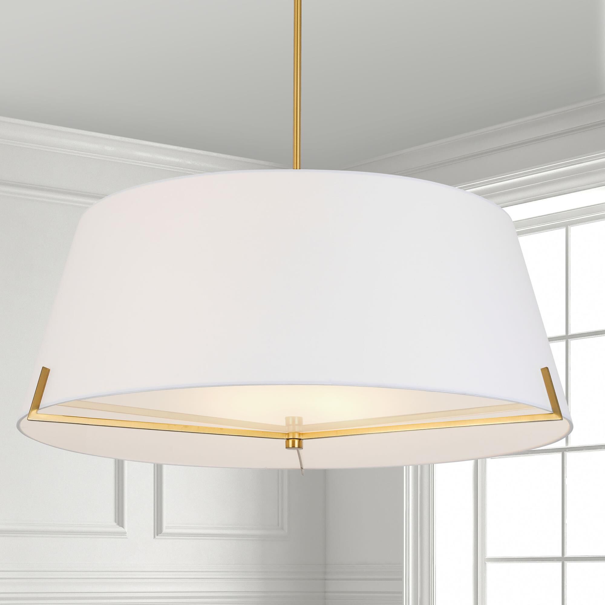 Shown in White and Aged Brass finish and White Fabric Tapered Drum shade
