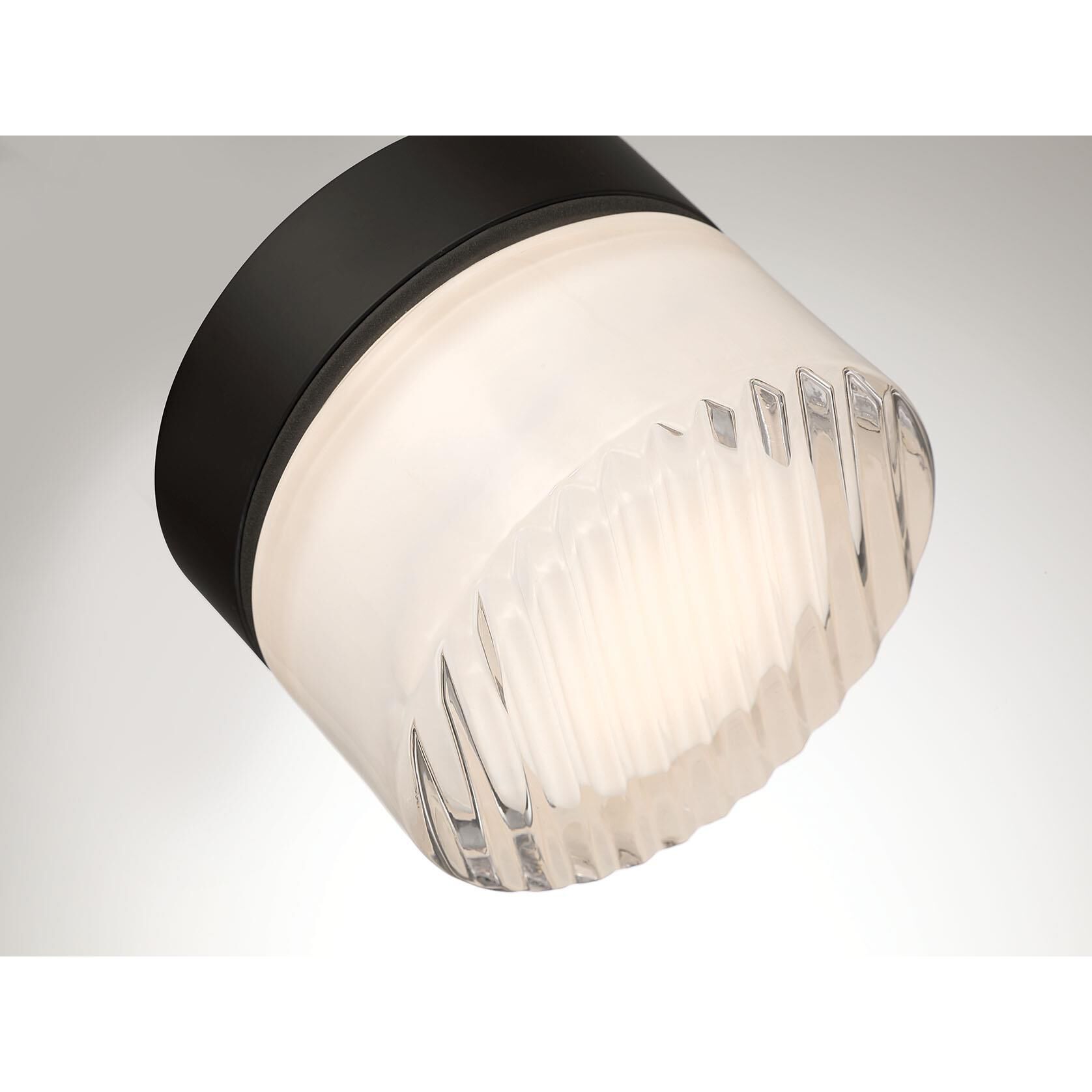 Shown in Matte Black finish and Clear Ribbed glass