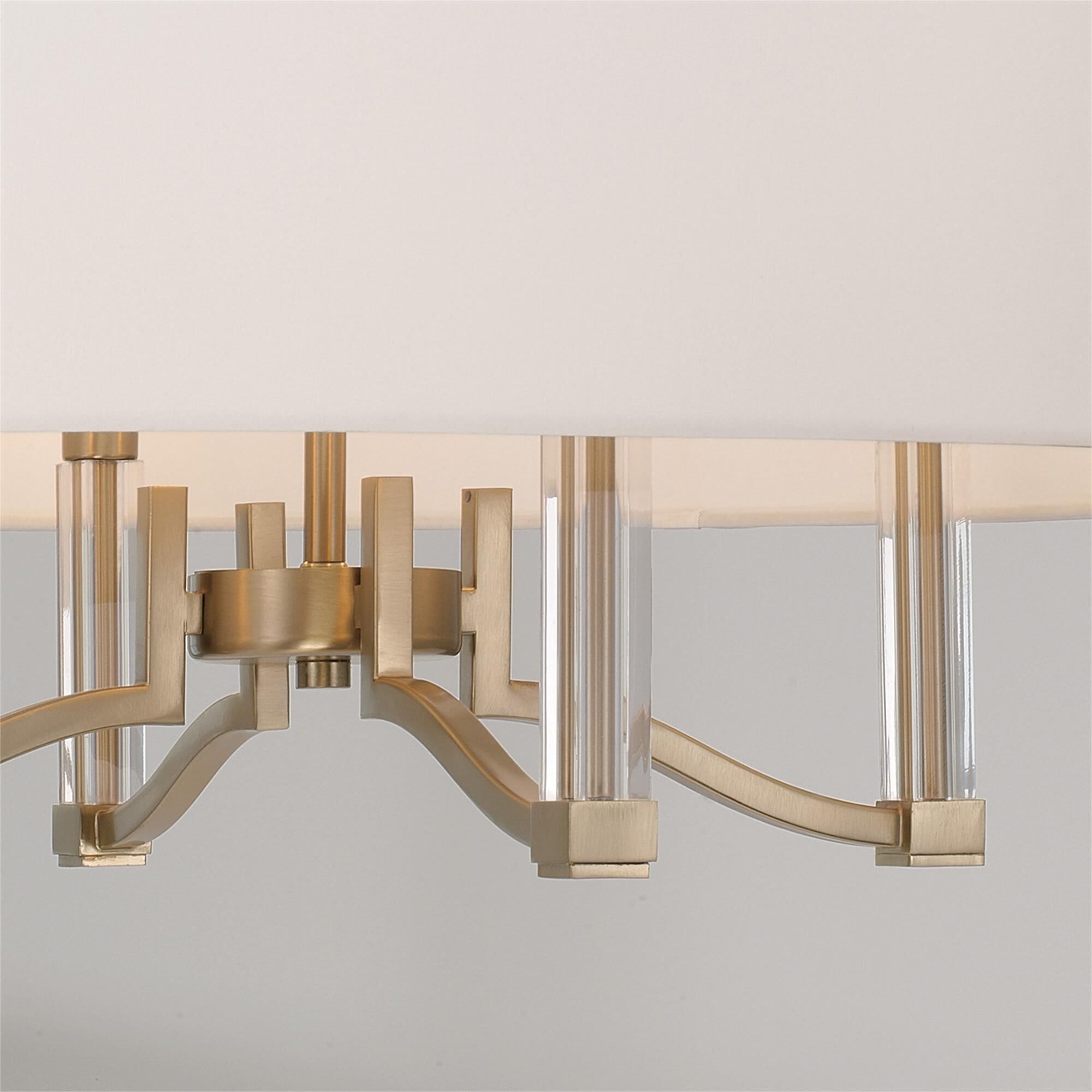 Shown in Matte Brass finish and White Fabric shade