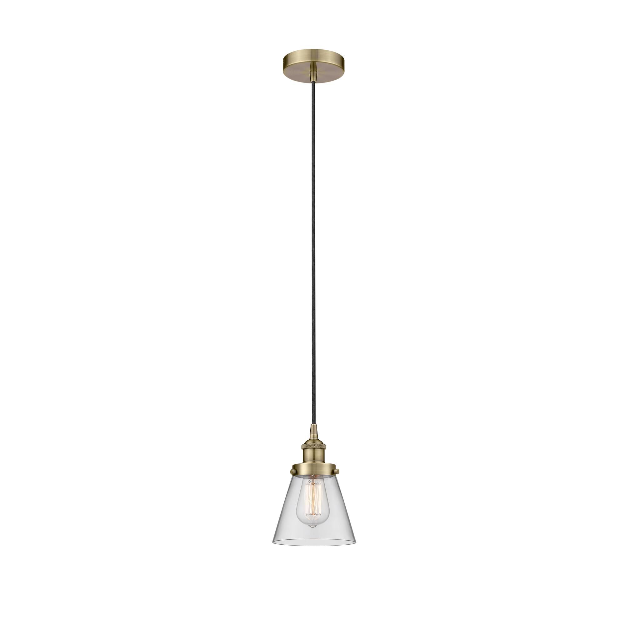 Shown in Antique Brass finish and Clear Small Cone glass