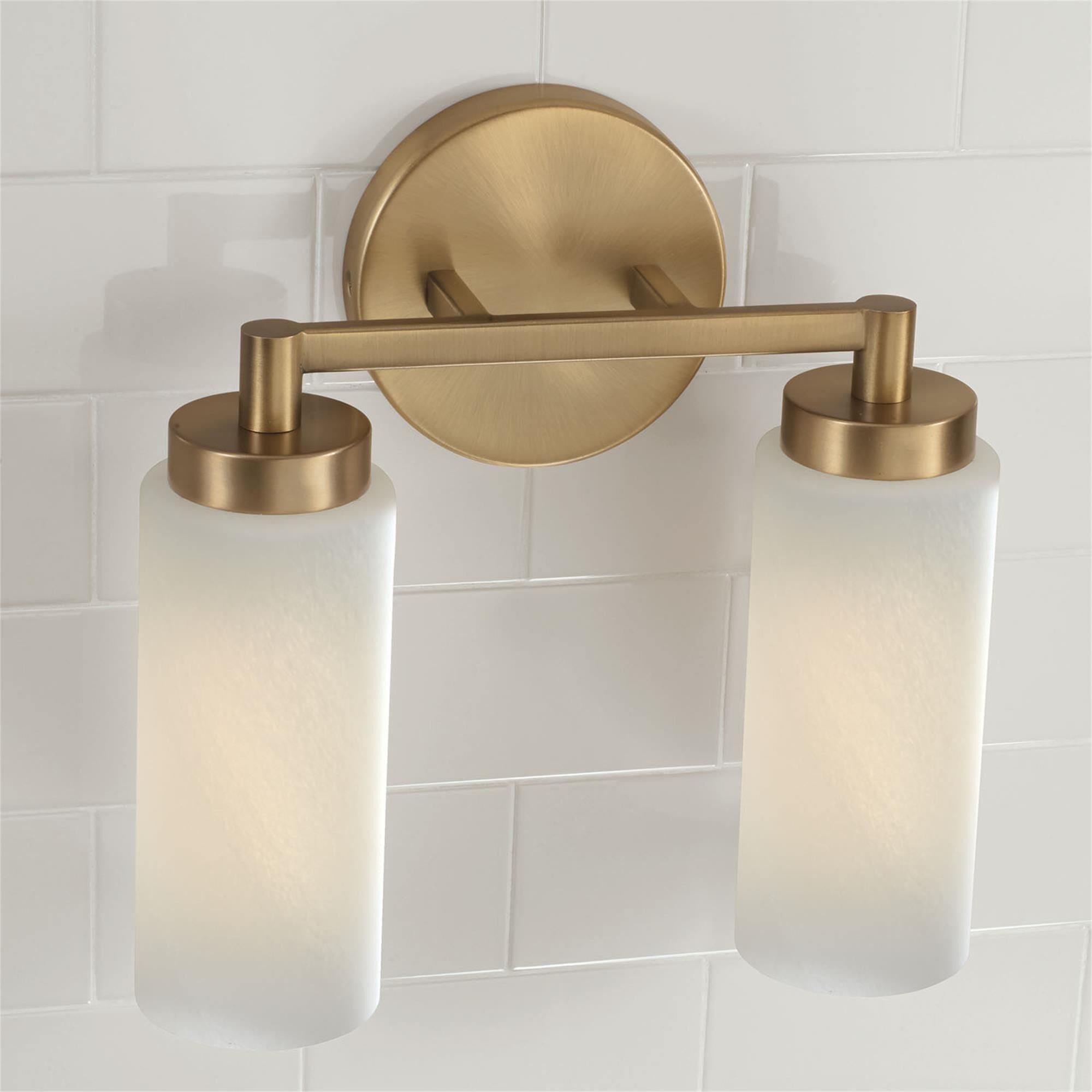 Shown in Aged Brass finish and Faux Alabaster glass