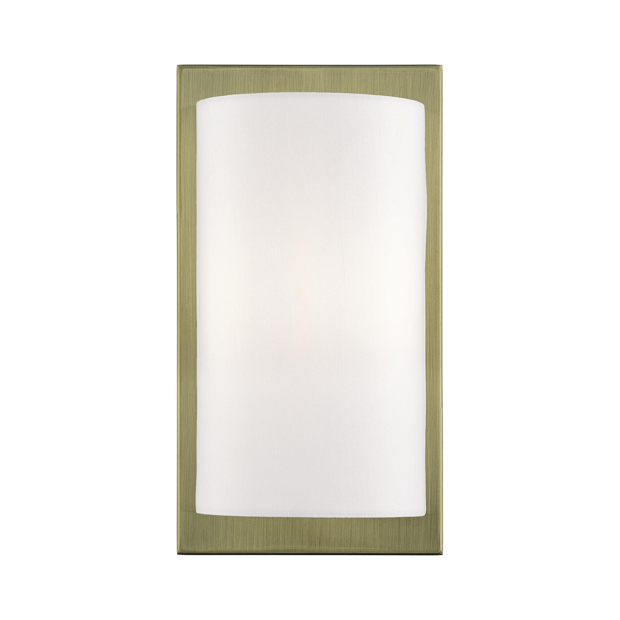 Shown in Antique Brass finish and Hand Crafted Off-White Fabric Hardback shade