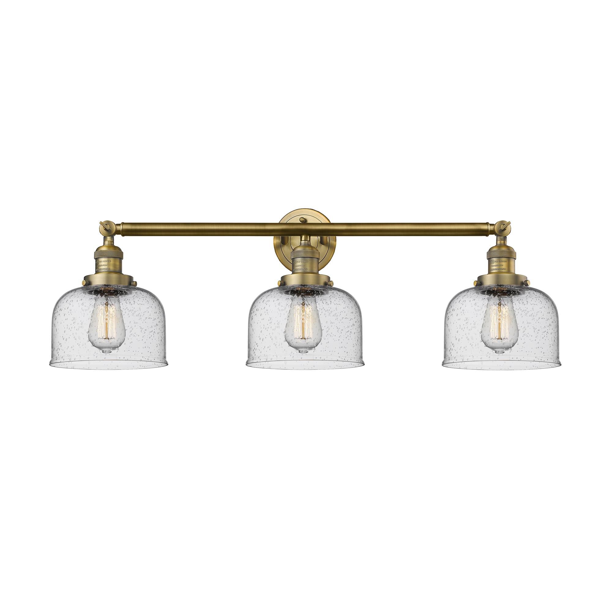 Shown in Brushed Brass finish and Seedy glass