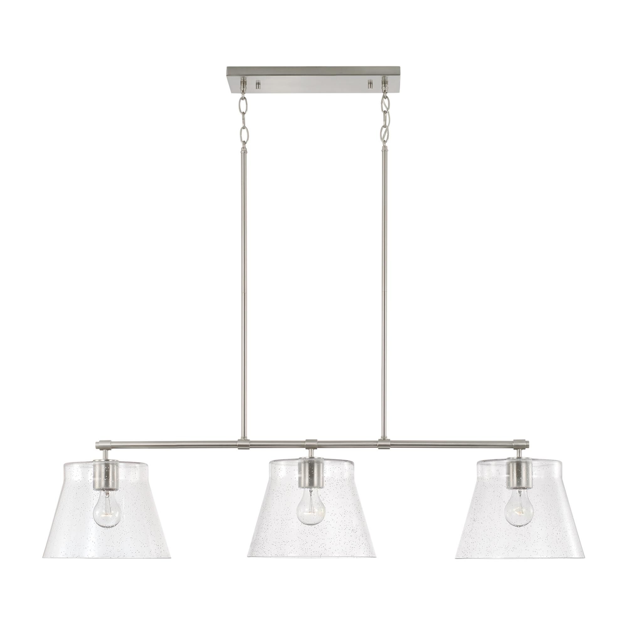Shown in Brushed Nickel finish and Clear Seeded glass