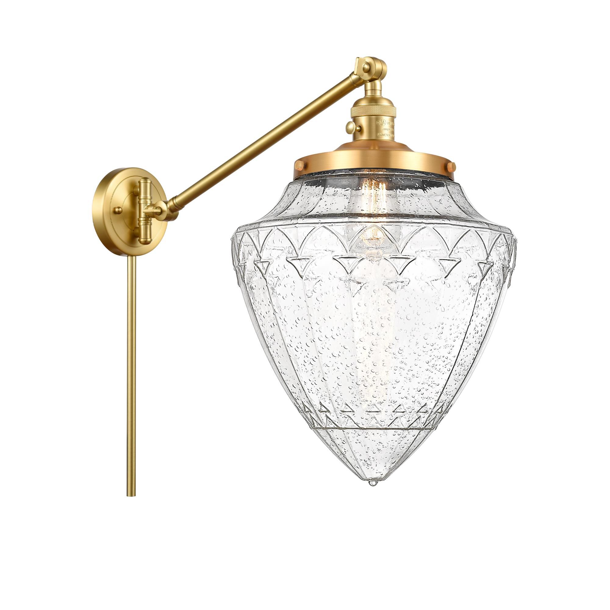 Shown in Satin Gold finish and Seedy glass