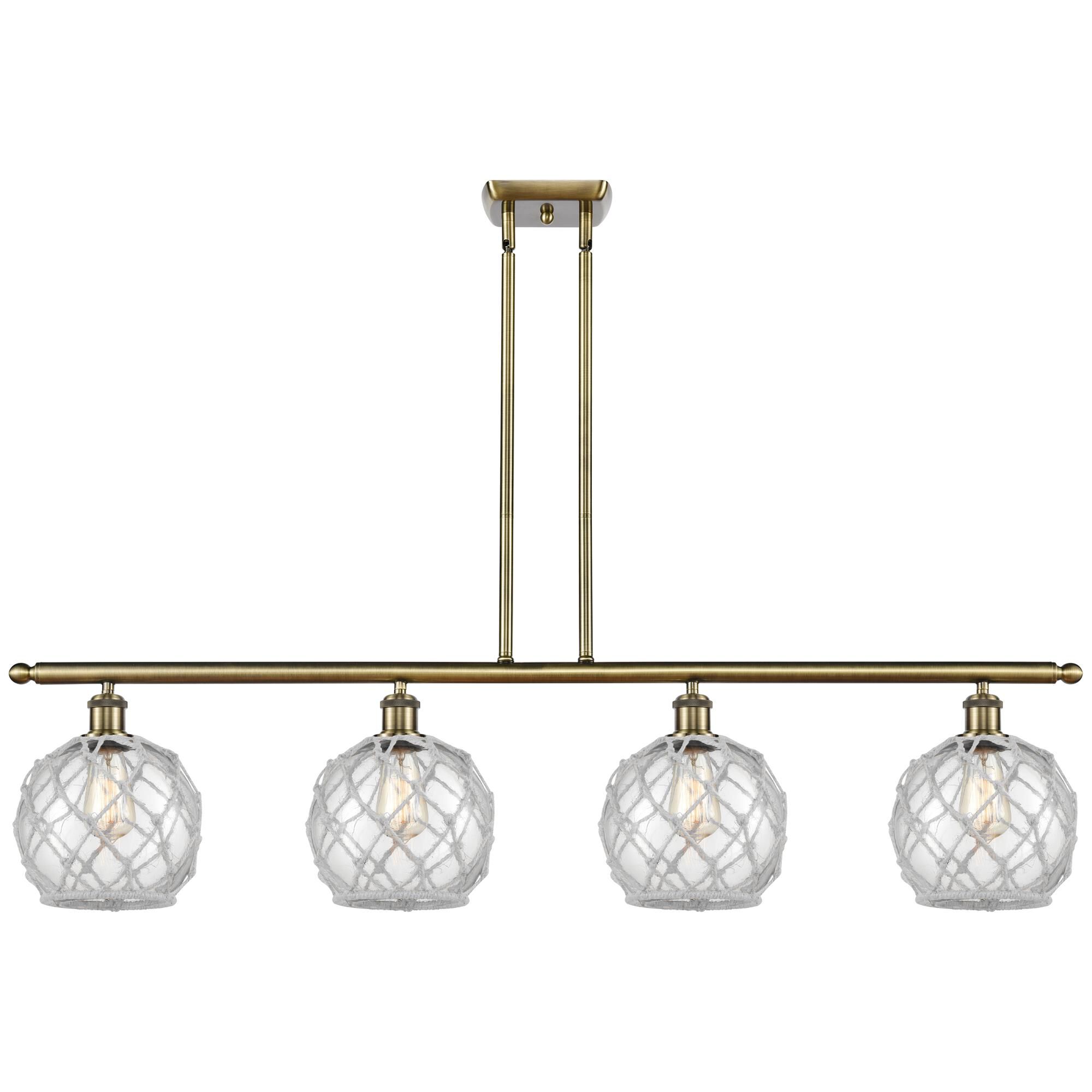 Shown in Antique Brass finish and Clear with White Rope glass