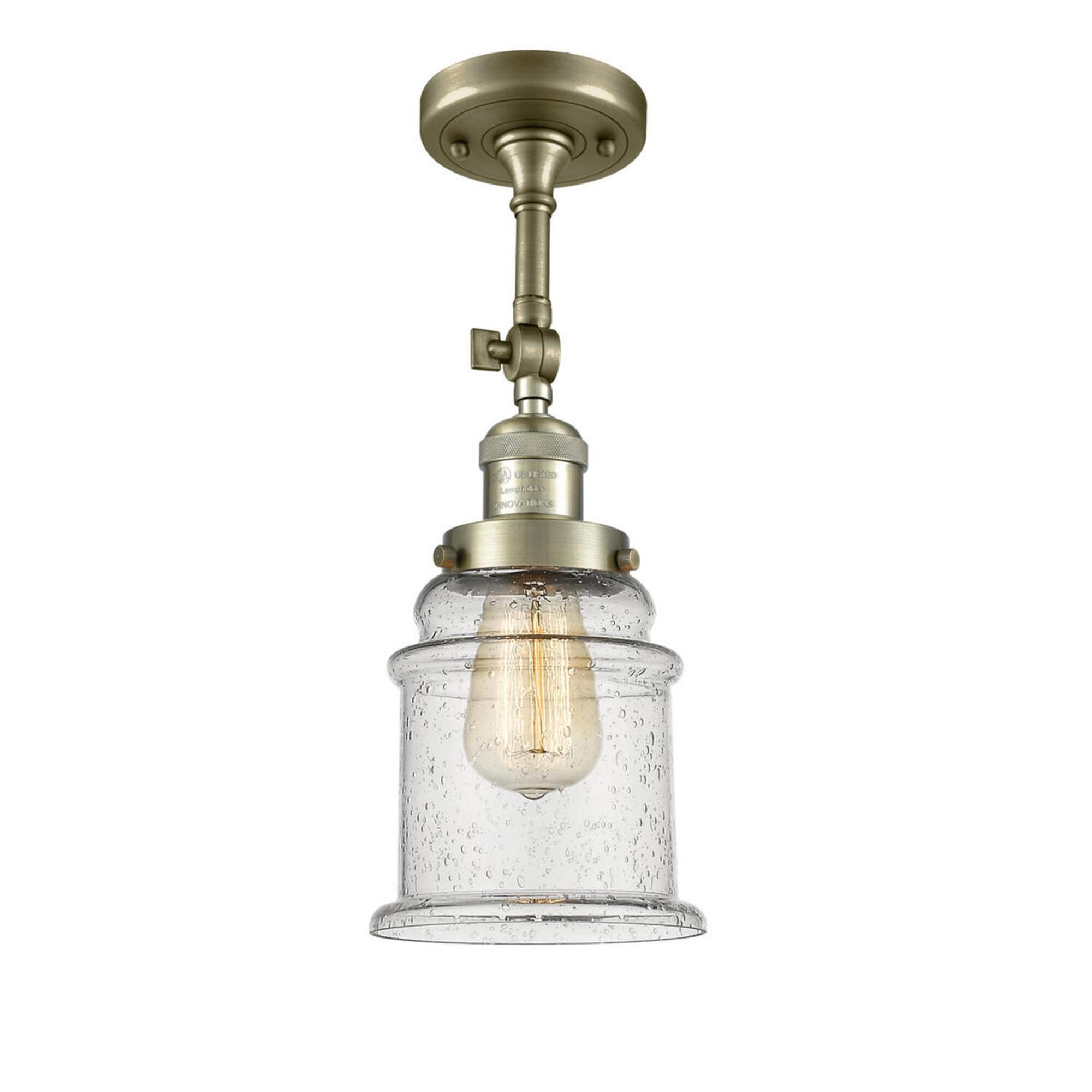 Shown in Antique Brass finish and Seedy glass and No Accent accent