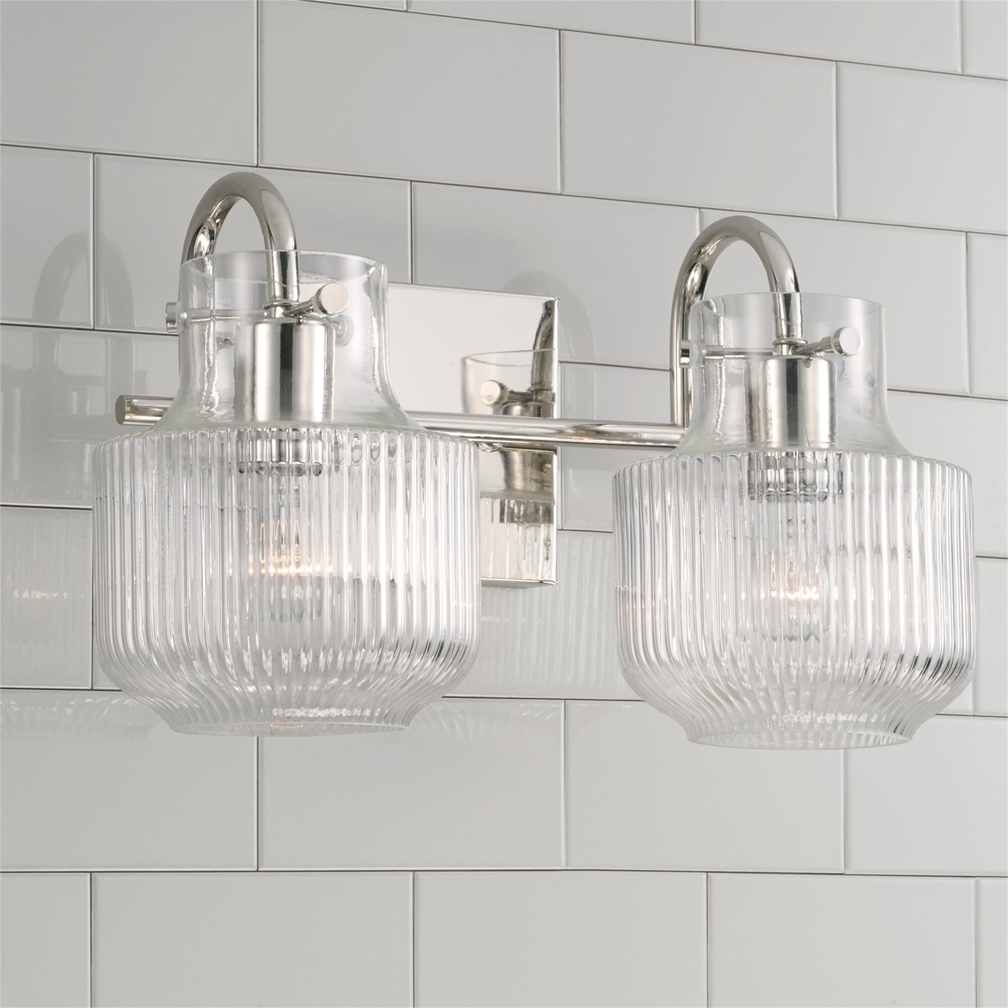 Shown in Polished Nickel finish and Clear Fluted glass