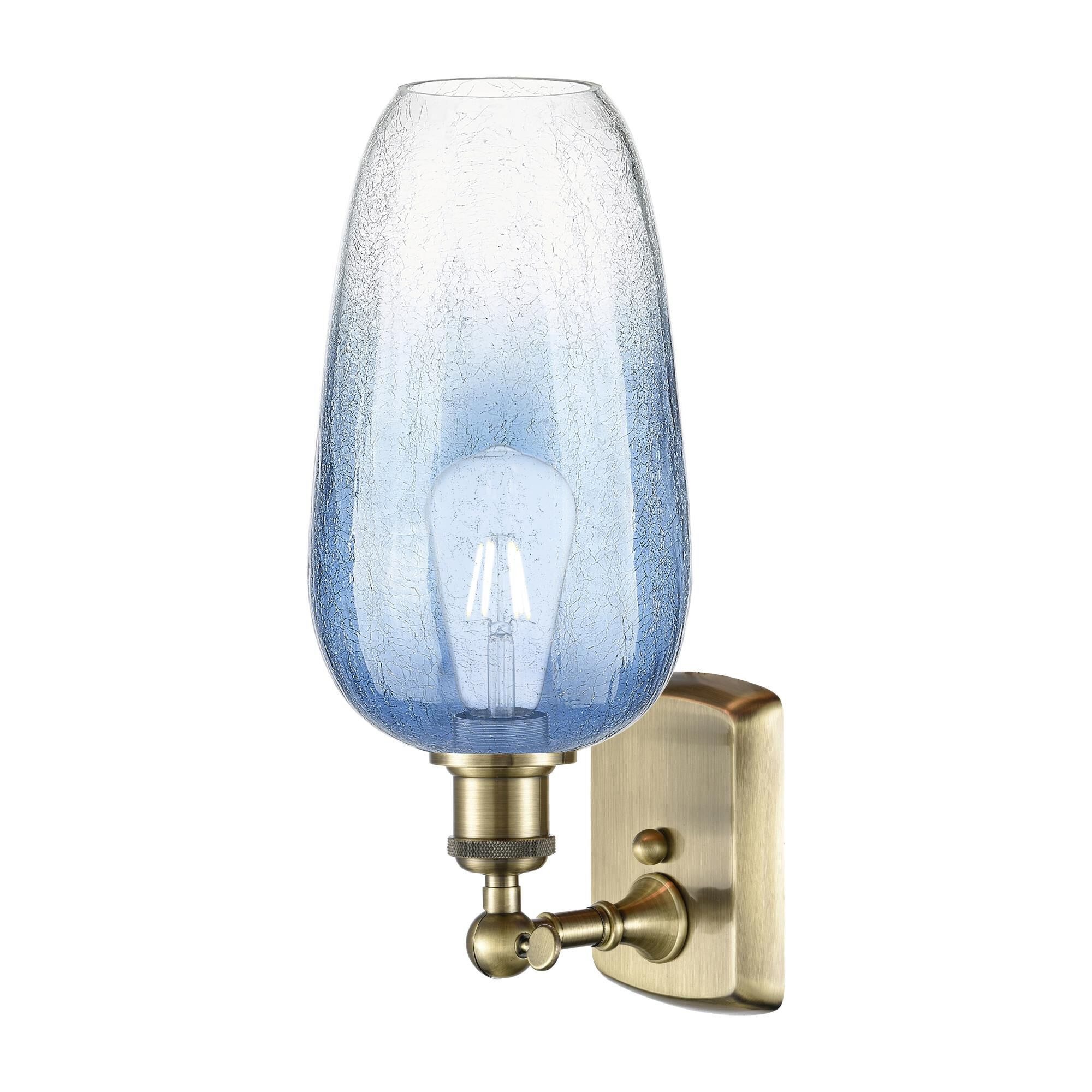 Shown in Antique Brass finish and Sapphire Blue glass