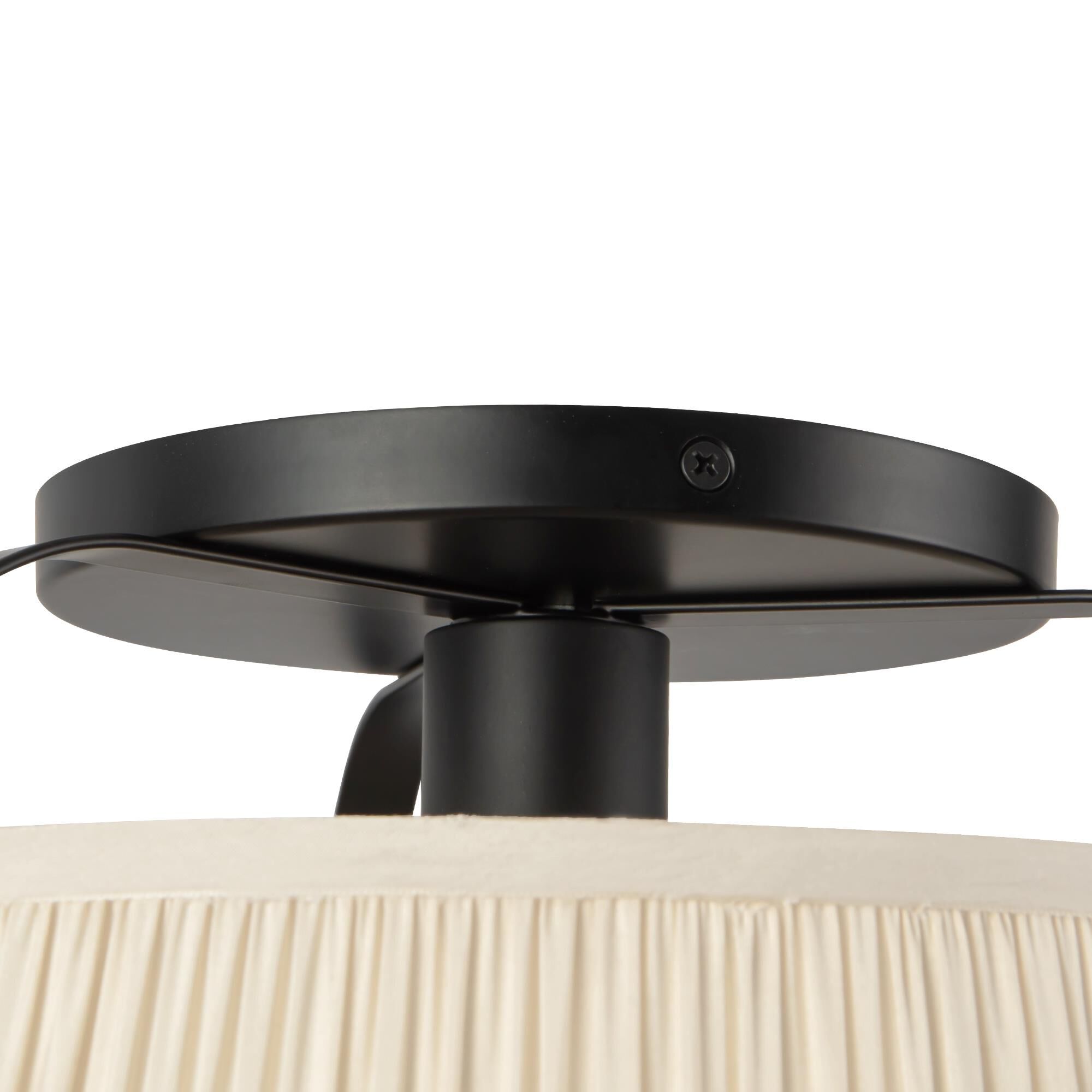 Shown in Matte Black finish and Frosted Polycarbonate Diffuser glass and White Linen shade