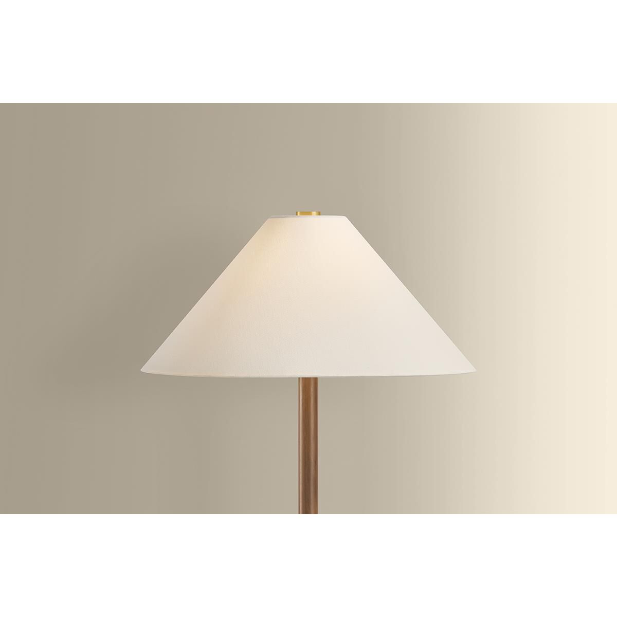 Shown in Aged Brass finish and White Linen shade