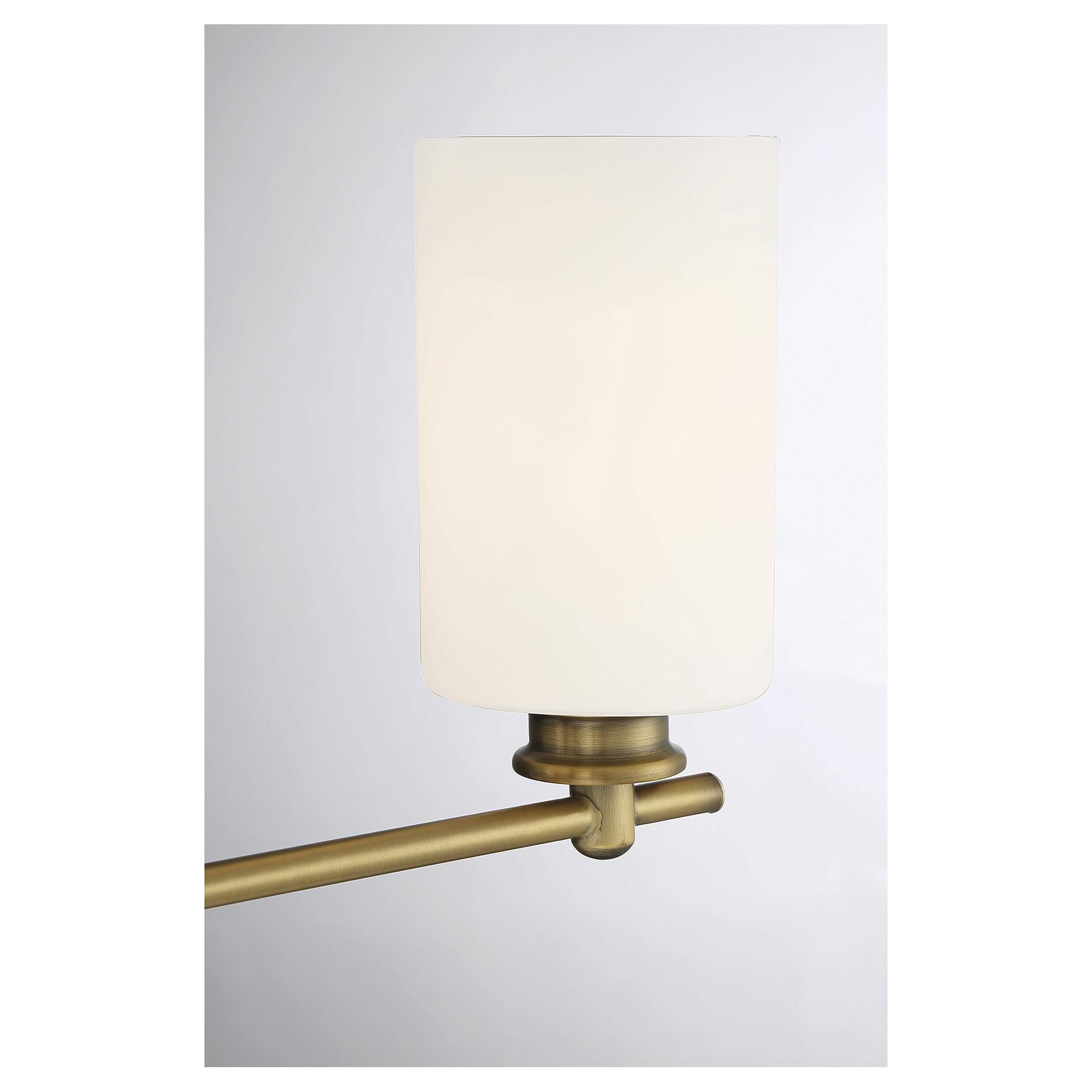 Shown in Warm Brass finish and White glass