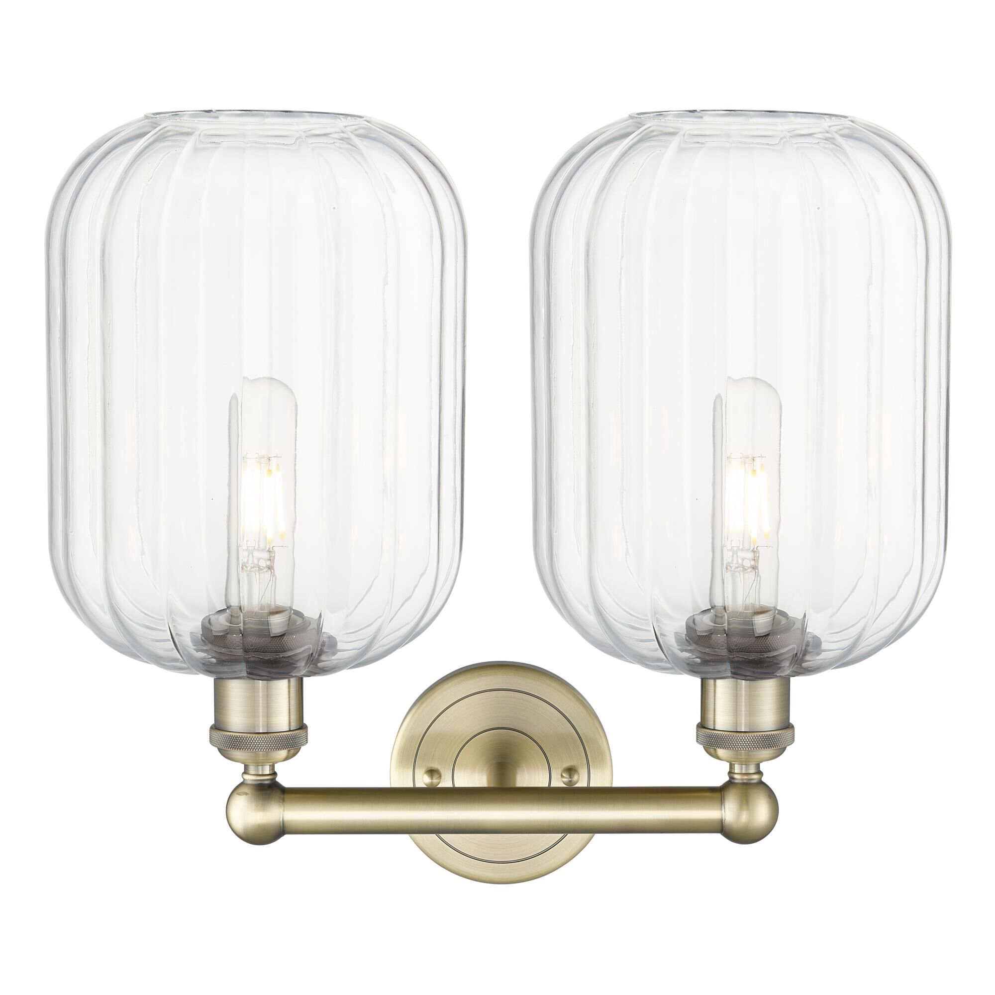 Shown in Antique Brass finish and Clear glass