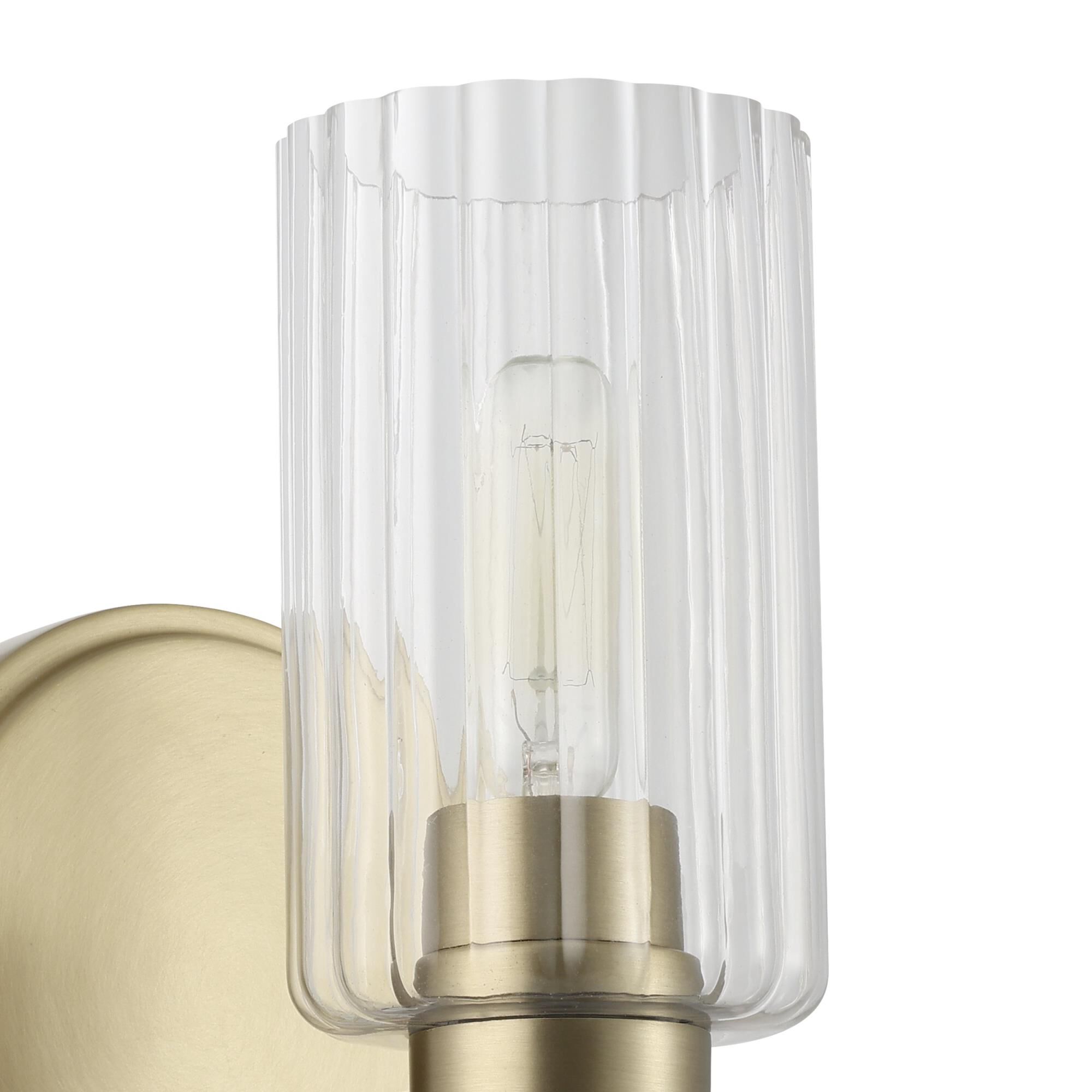 Shown in Champagne Gold finish and Clear Ribbed glass