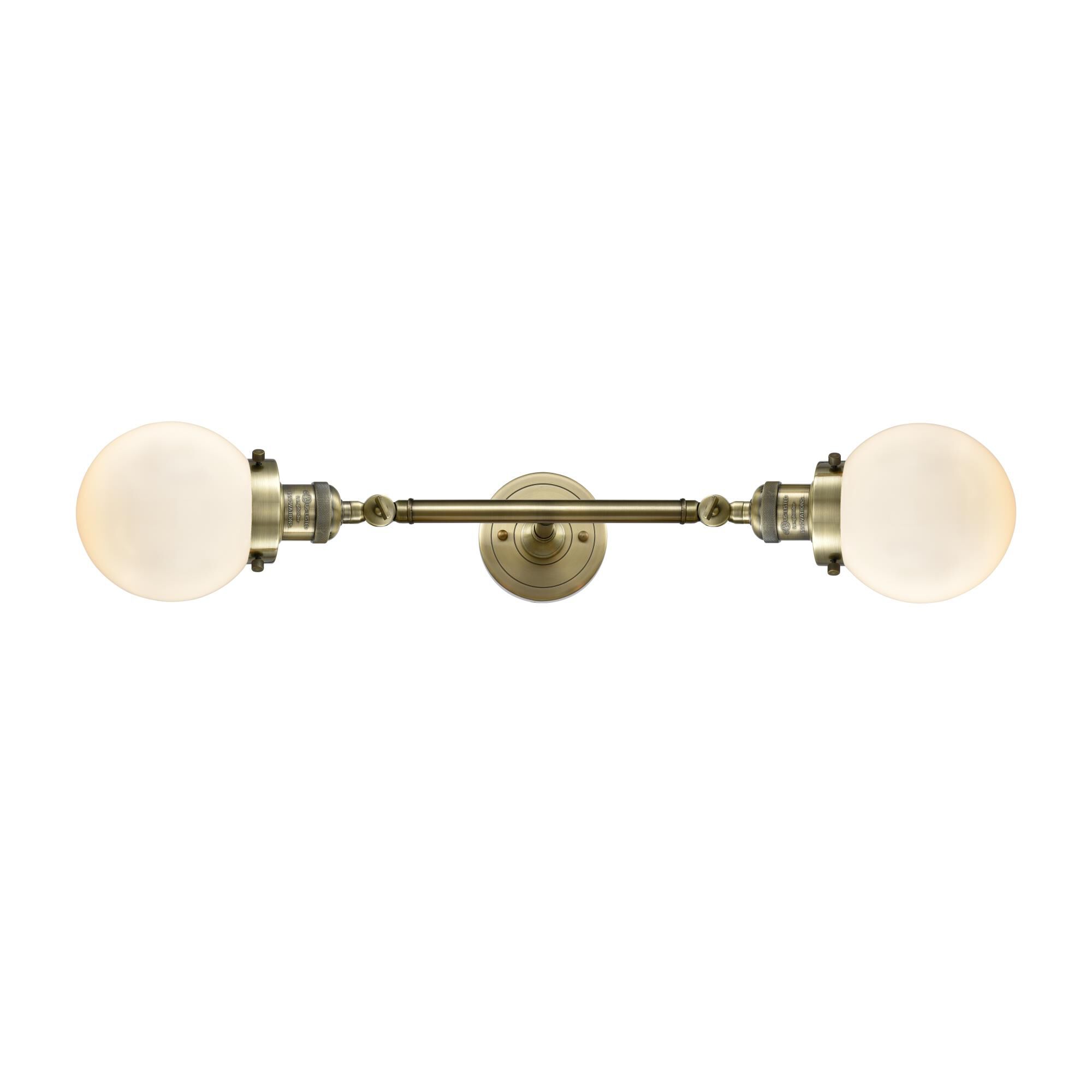 Shown in Antique Brass finish and Matte White Cased glass