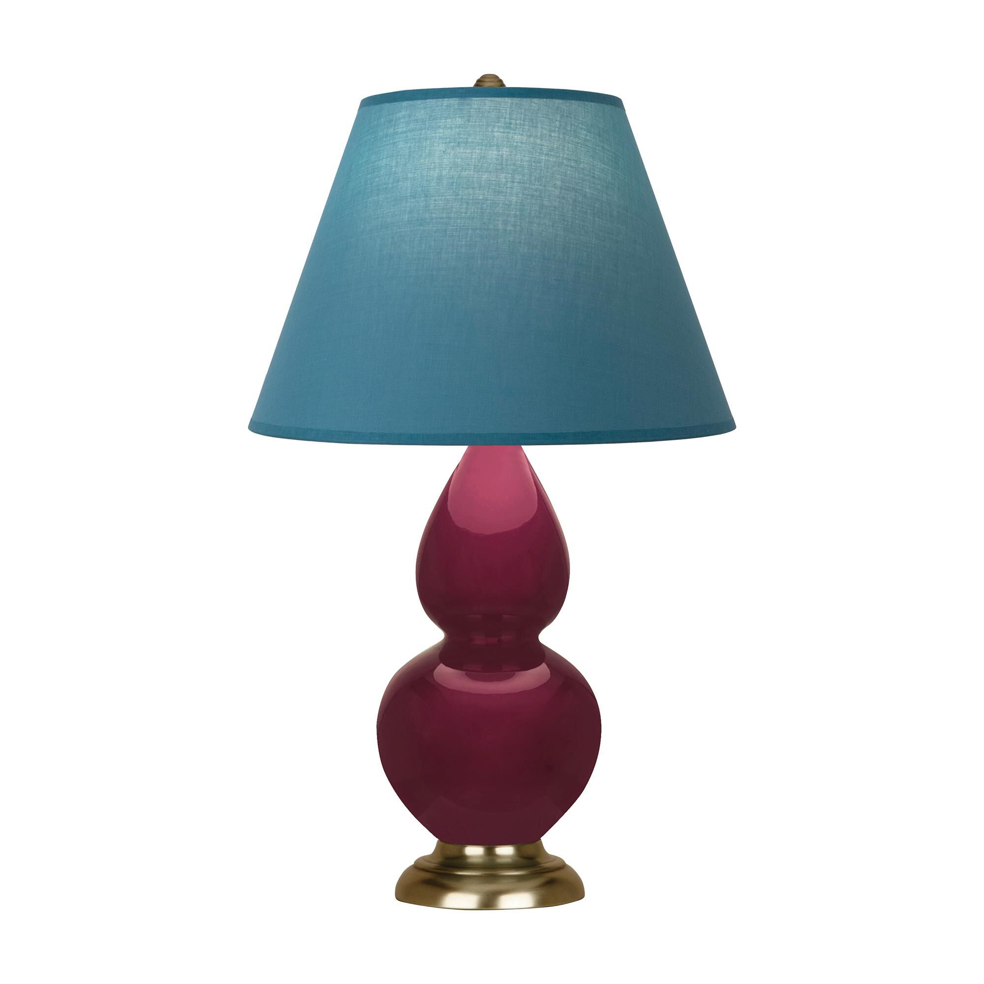Shown in Sugar Plum finish and Bright Blue with Gray Lining shade and Antique Brass accent
