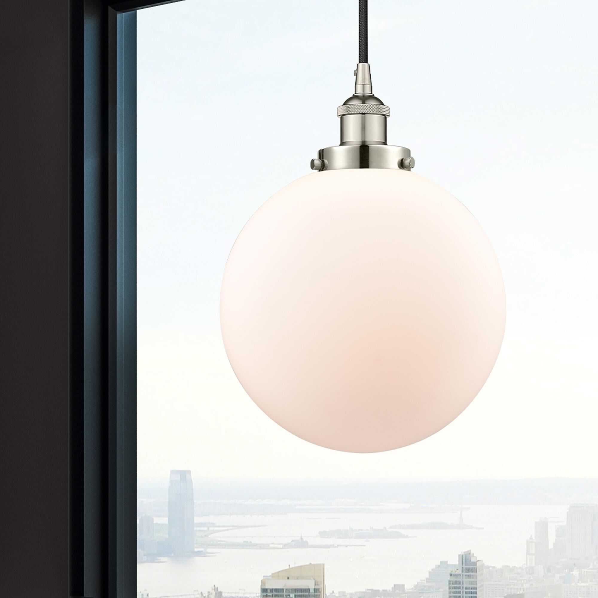 Shown in Polished Nickel finish and Matte White Cased Beacon glass