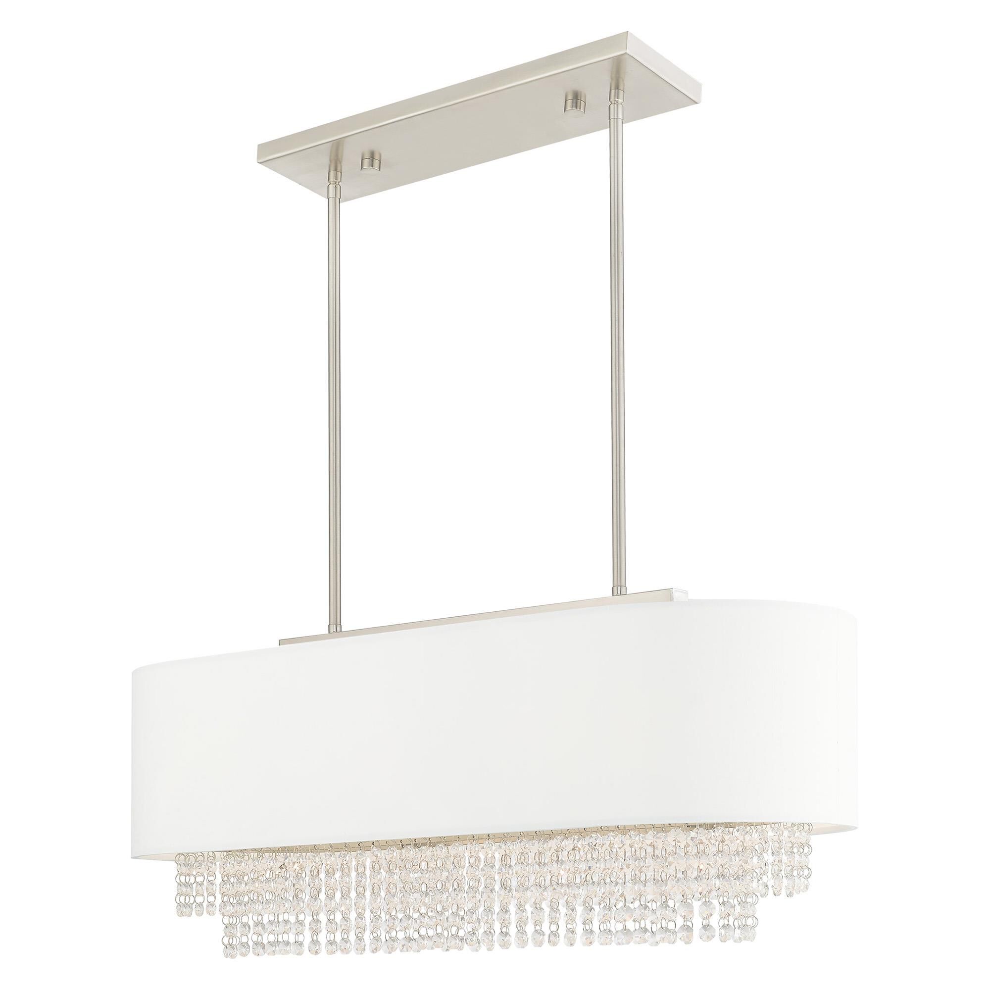 Shown in Brushed Nickel finish and Clear Crystals with Hand Crafted Off-White Fabric Hardback shade