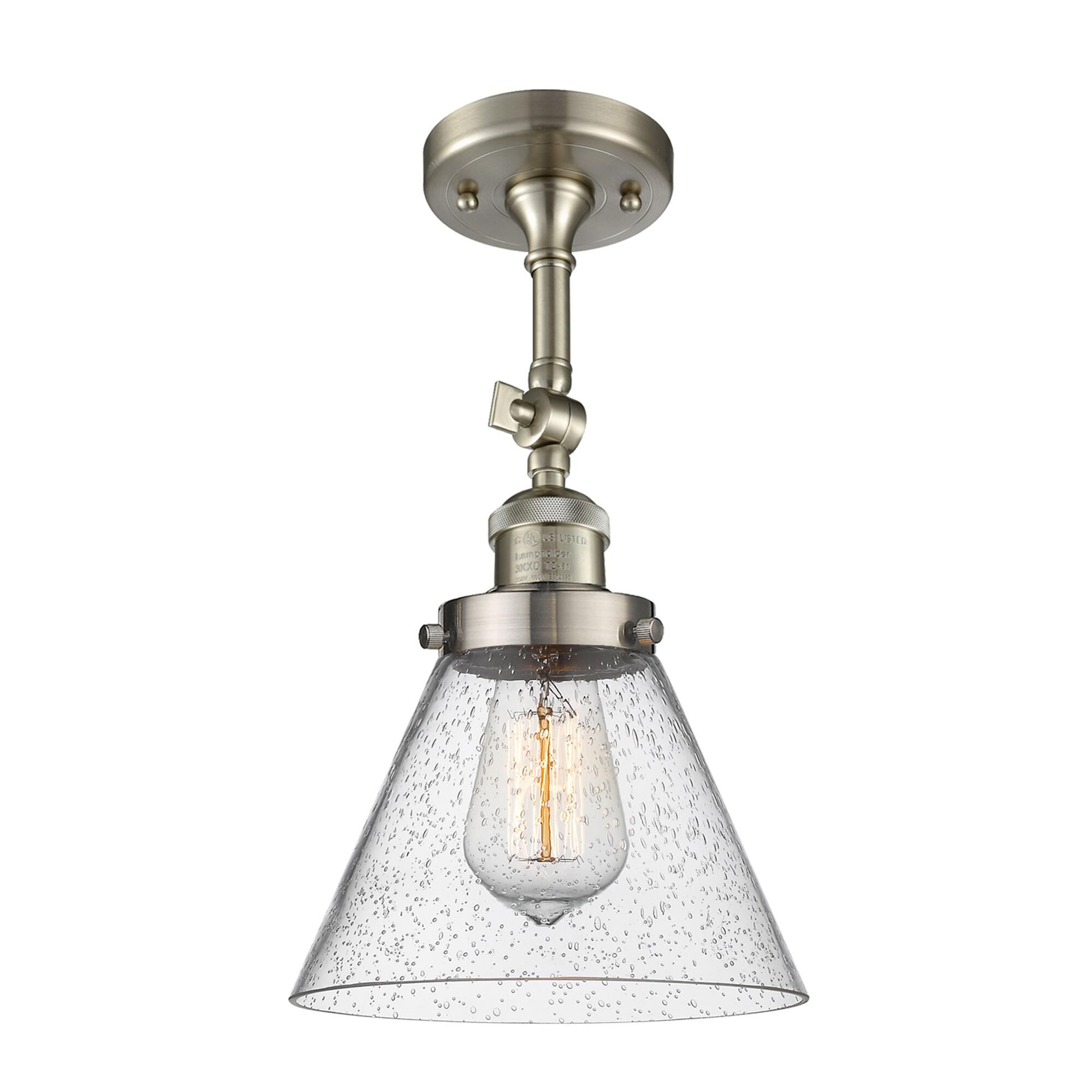 Shown in Brushed Satin Nickel finish and Seedy glass and None accent