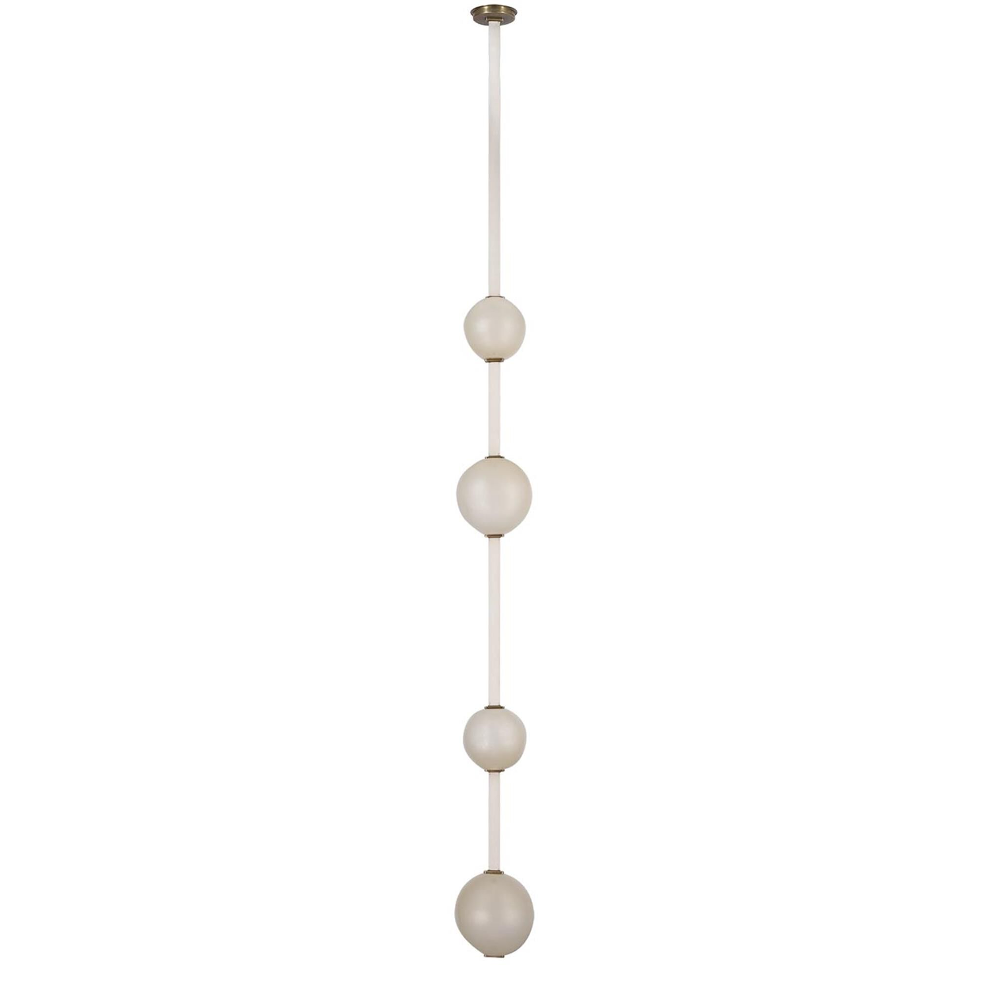 Shown in Bone Suede And Mottled Brass finish and Fizzy Nude glass
