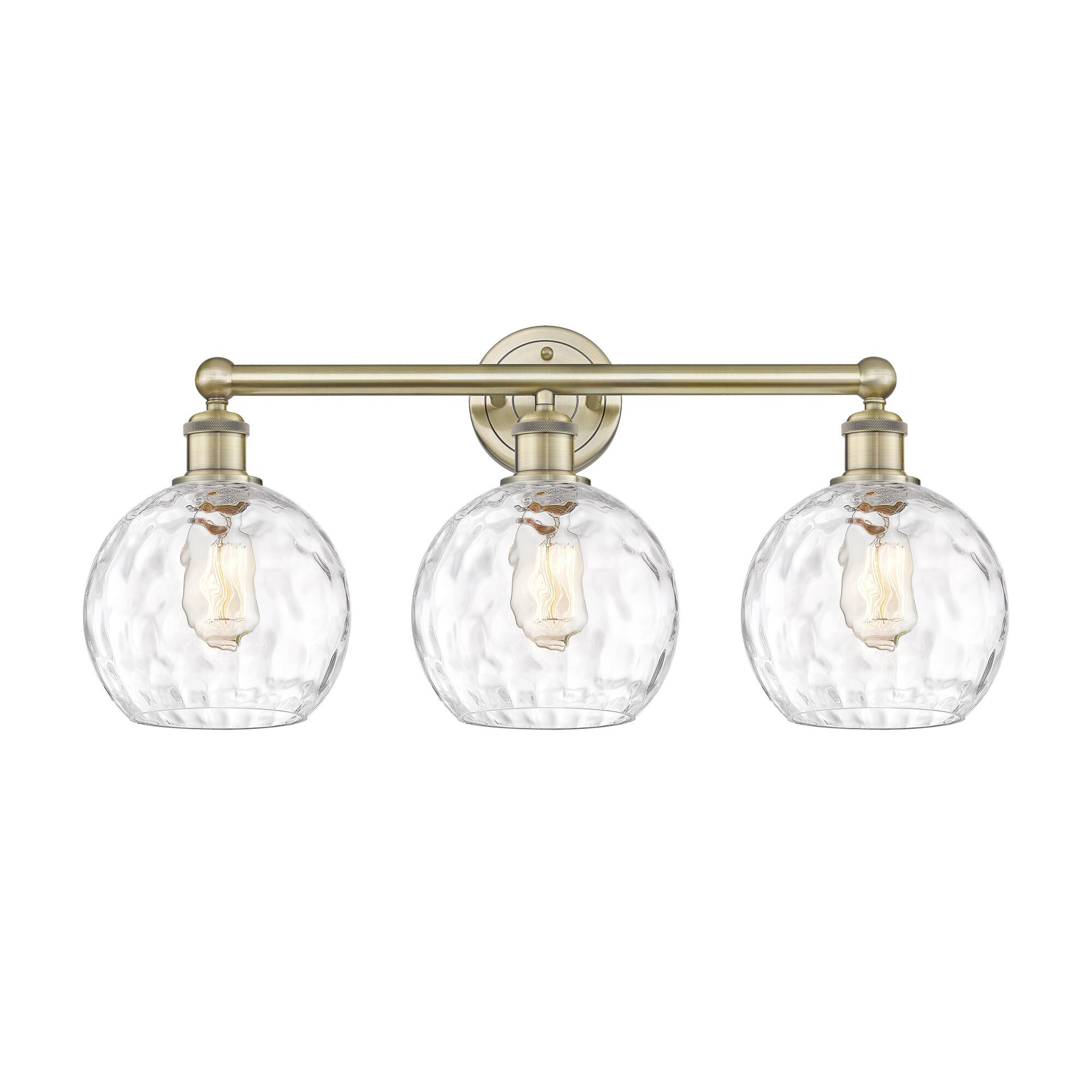 Shown in Antique Brass finish and Clear glass