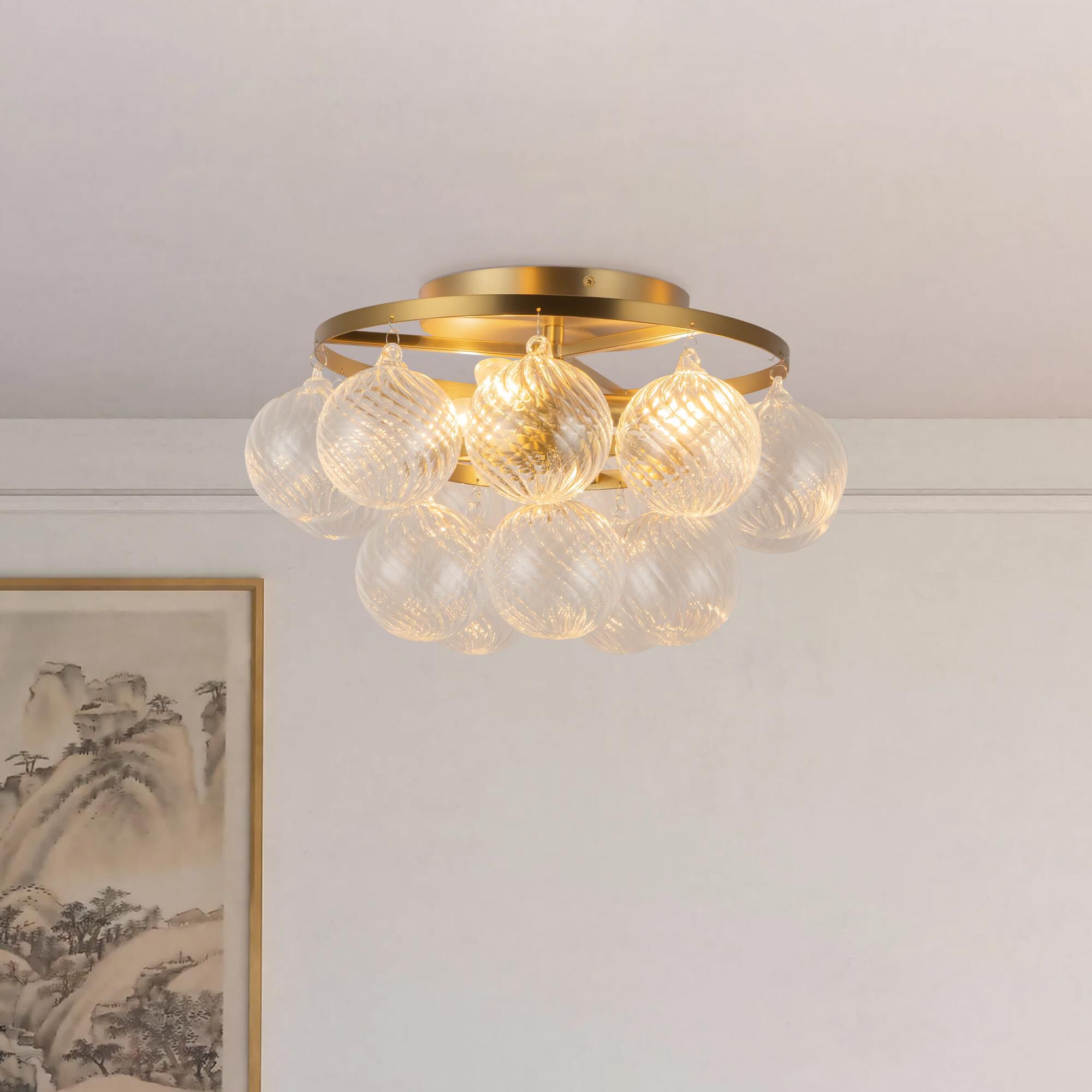 Shown in Brushed Gold finish and Clear Ribbed glass