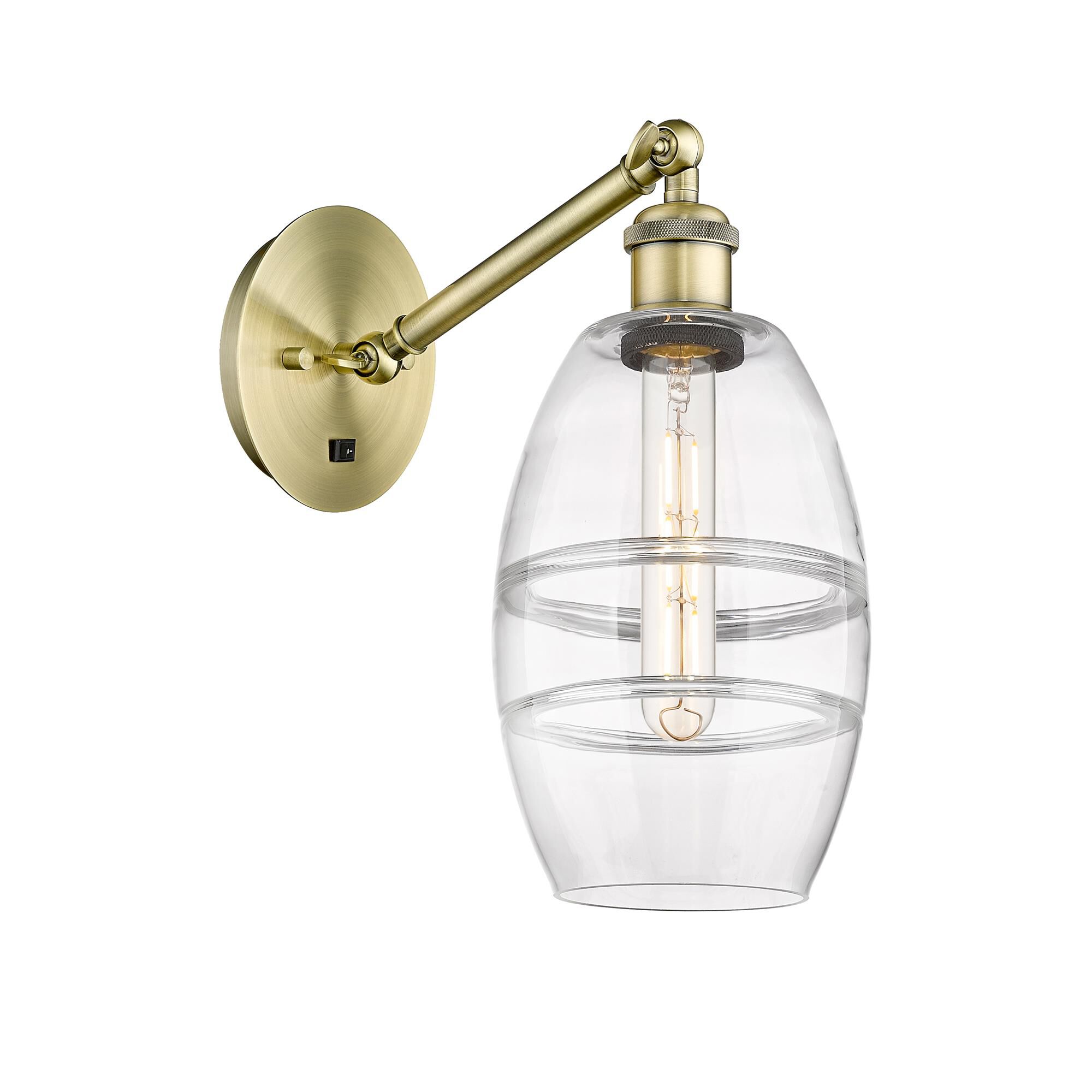 Shown in Antique Brass finish and Clear glass