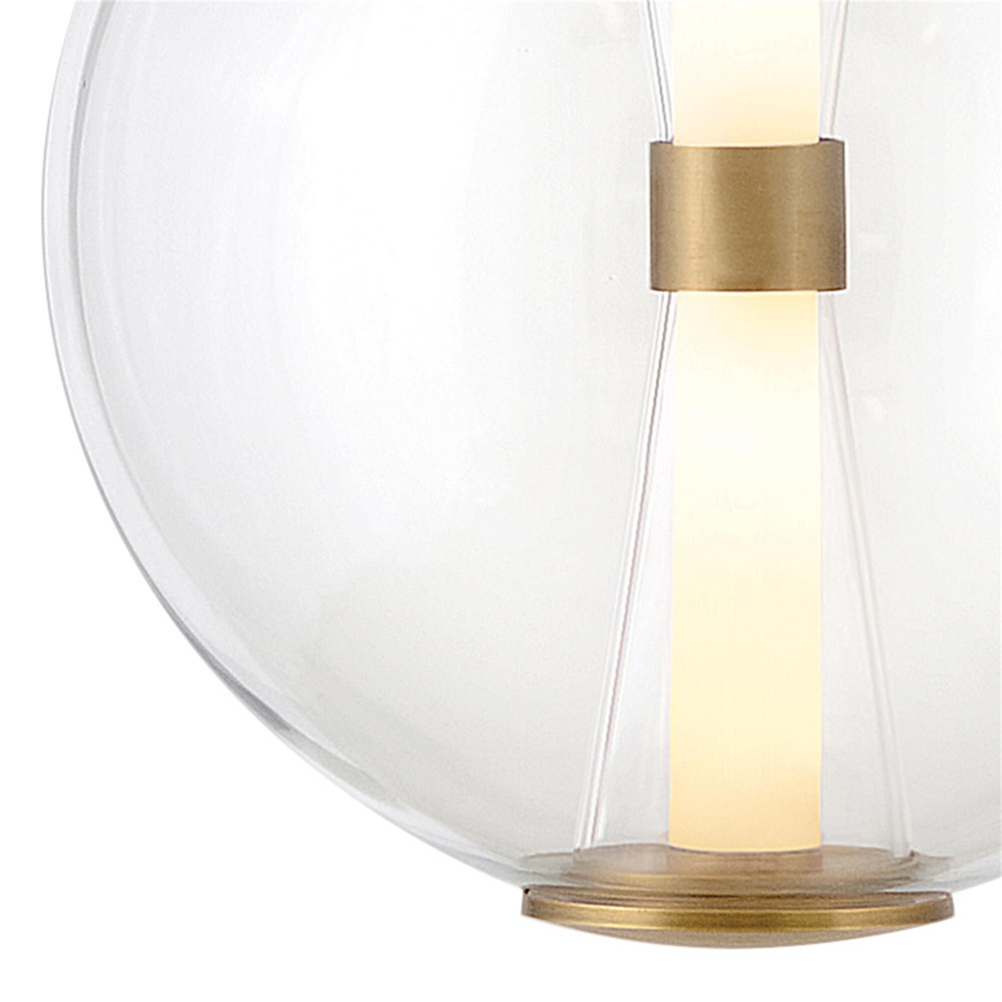 Shown in Lacquered Brass finish and Clear glass