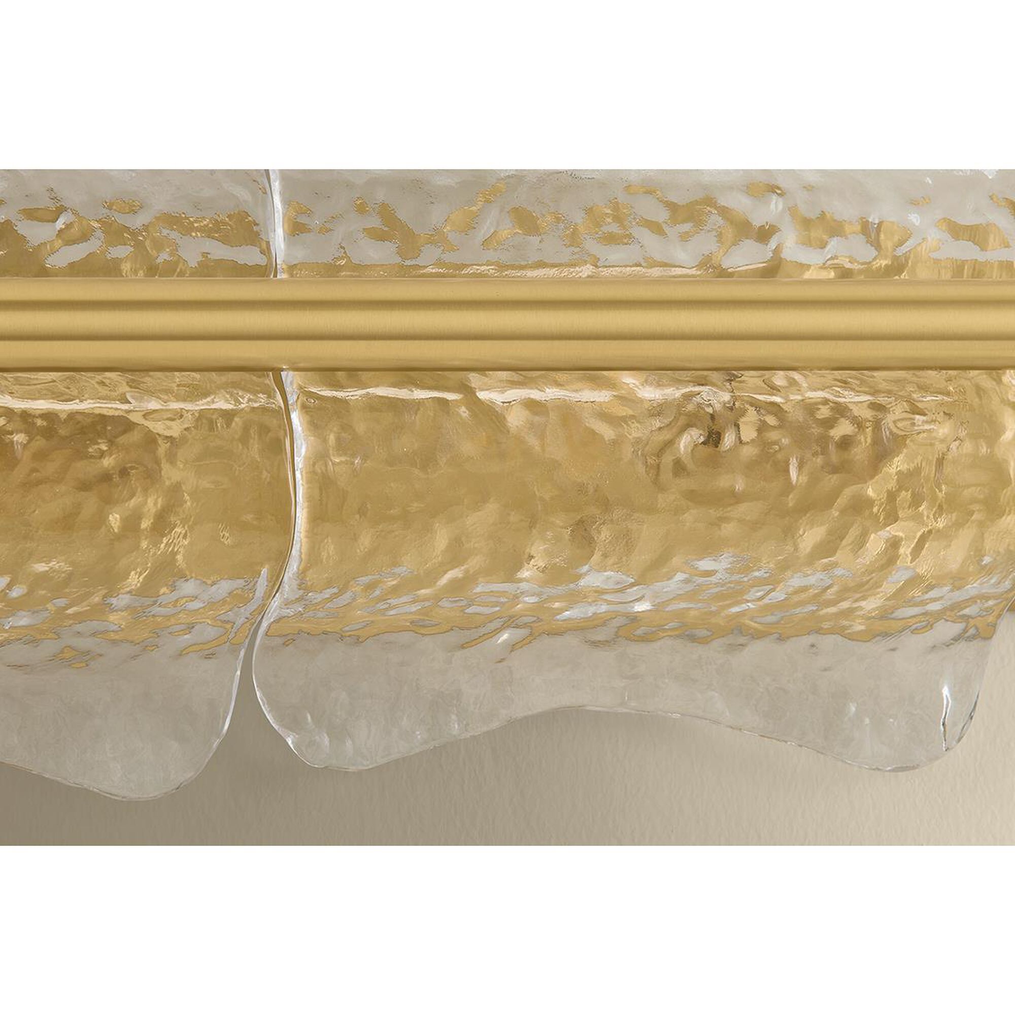 Shown in Aged Brass finish and Clear Optic glass