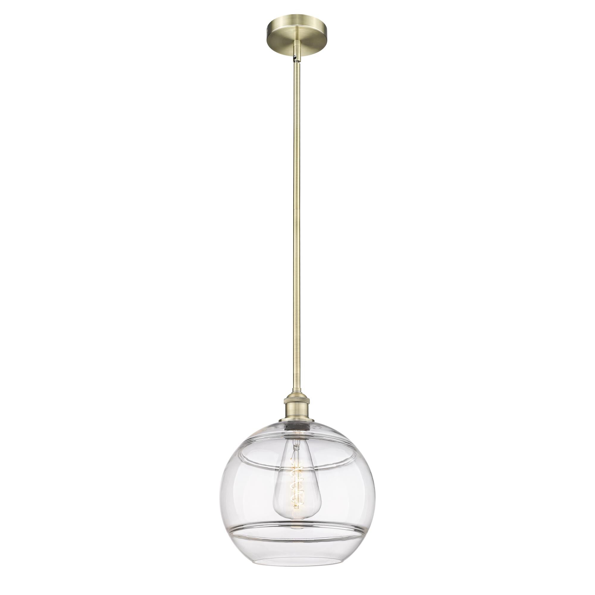 Shown in Antique Brass finish and Clear glass