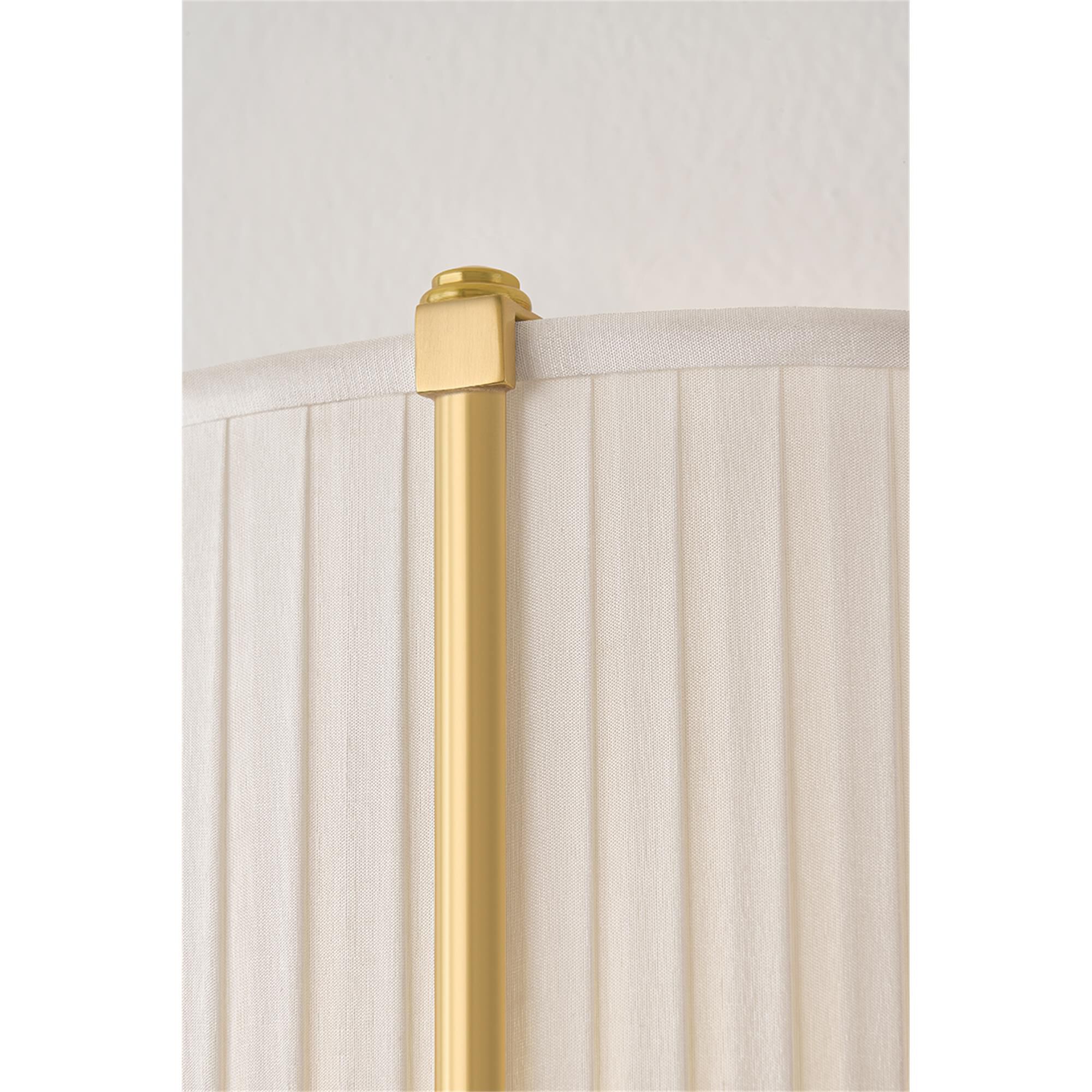 Shown in Aged Brass finish and Ivory Silk shade