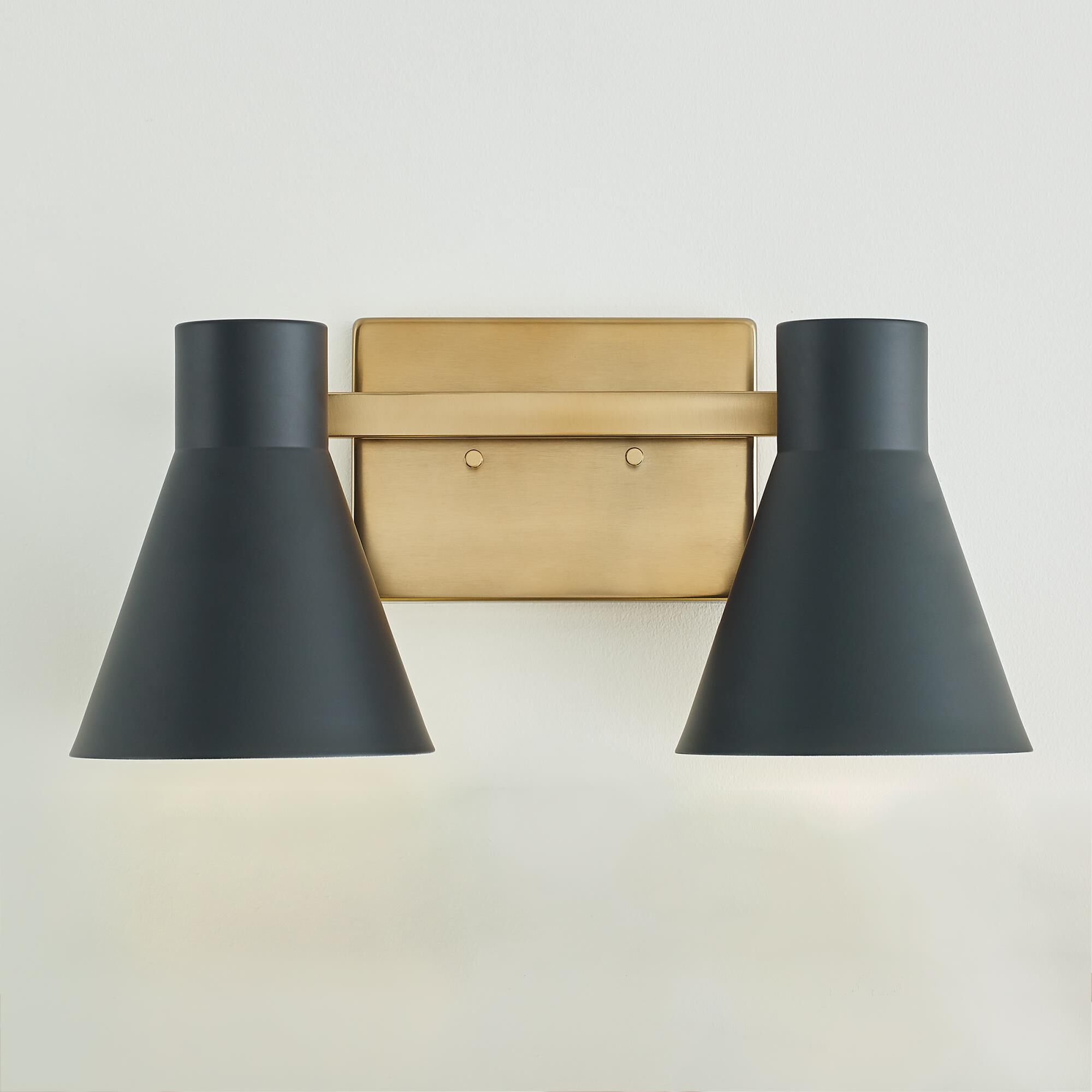 Shown in Satin Brass finish and Black Steel shade